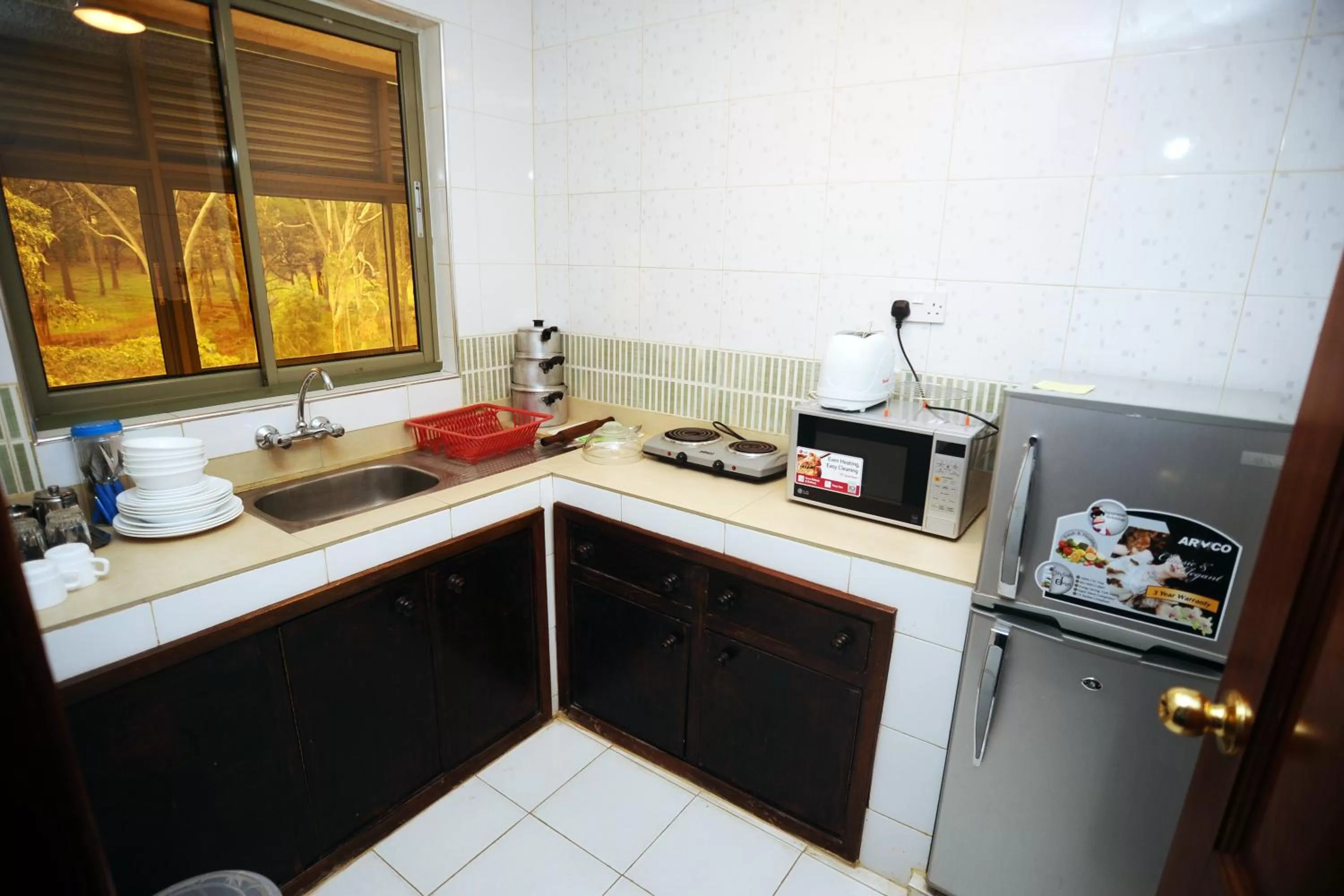 Kitchen or kitchenette in Kenya Comfort Suites