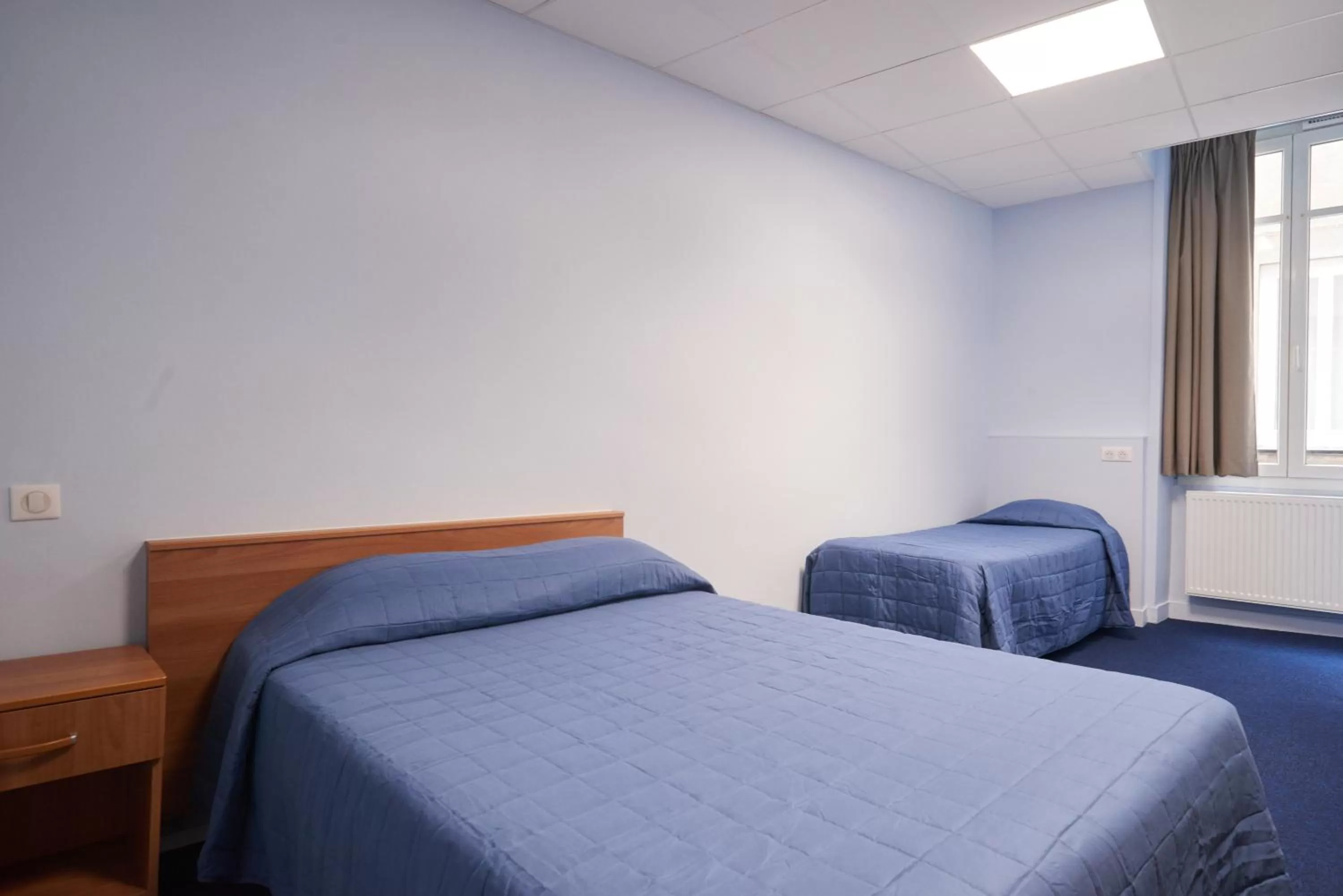 Bed in Hotel Le Petit Duquesne