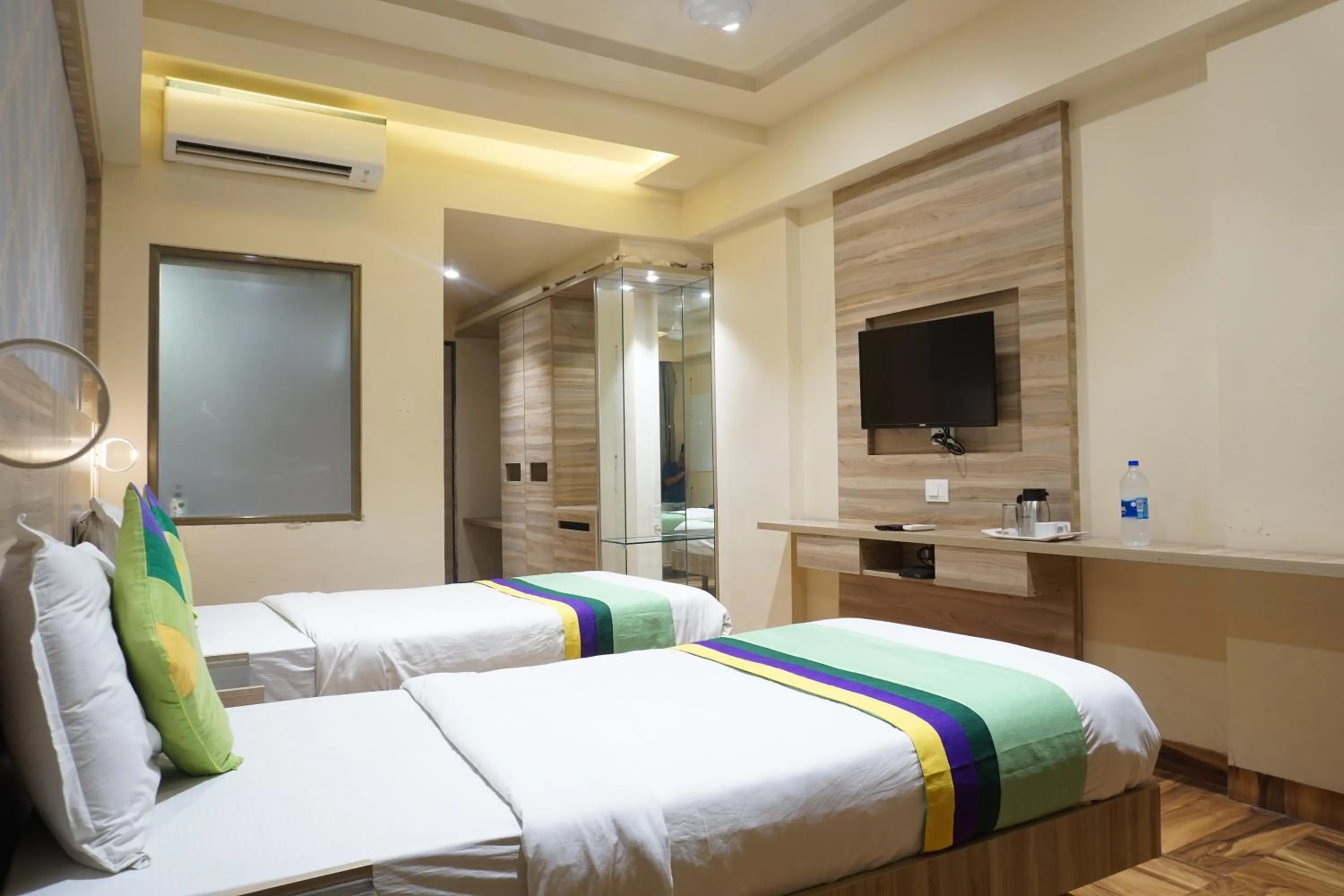 Bedroom, Bed in Treebo Classic Grande, Camp