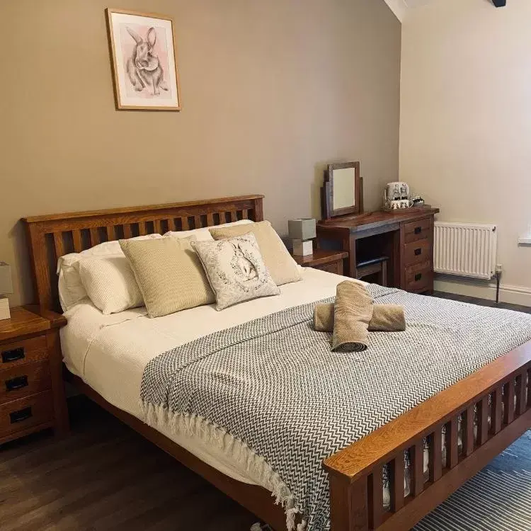 Bed in The Cottage Inn