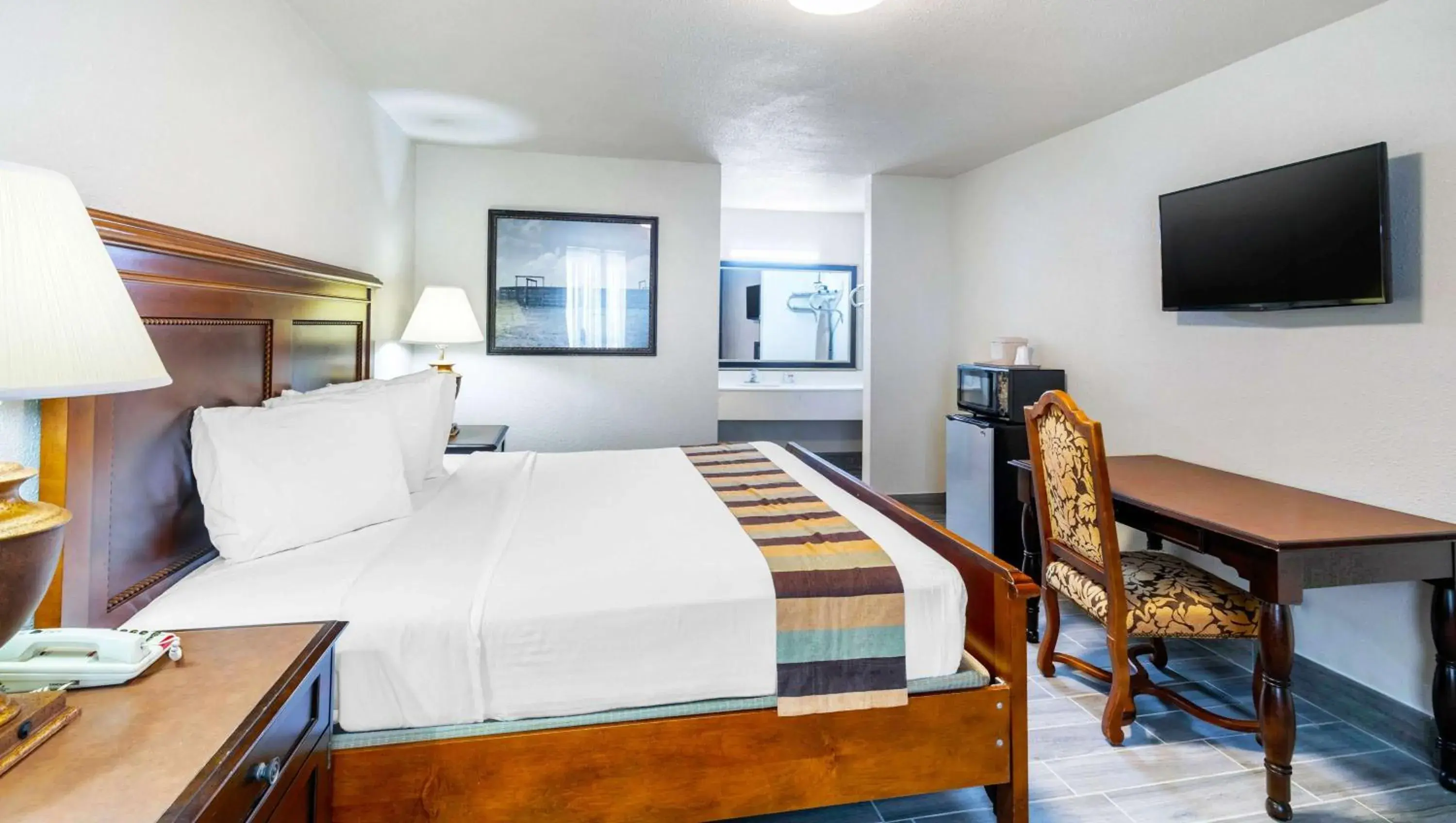 Photo of the whole room, Bed in Magnuson Grand Hotel and Conference Center Tyler Photo of the whole room, Bed in Magnuson Grand Hotel and Conference Center Tyler