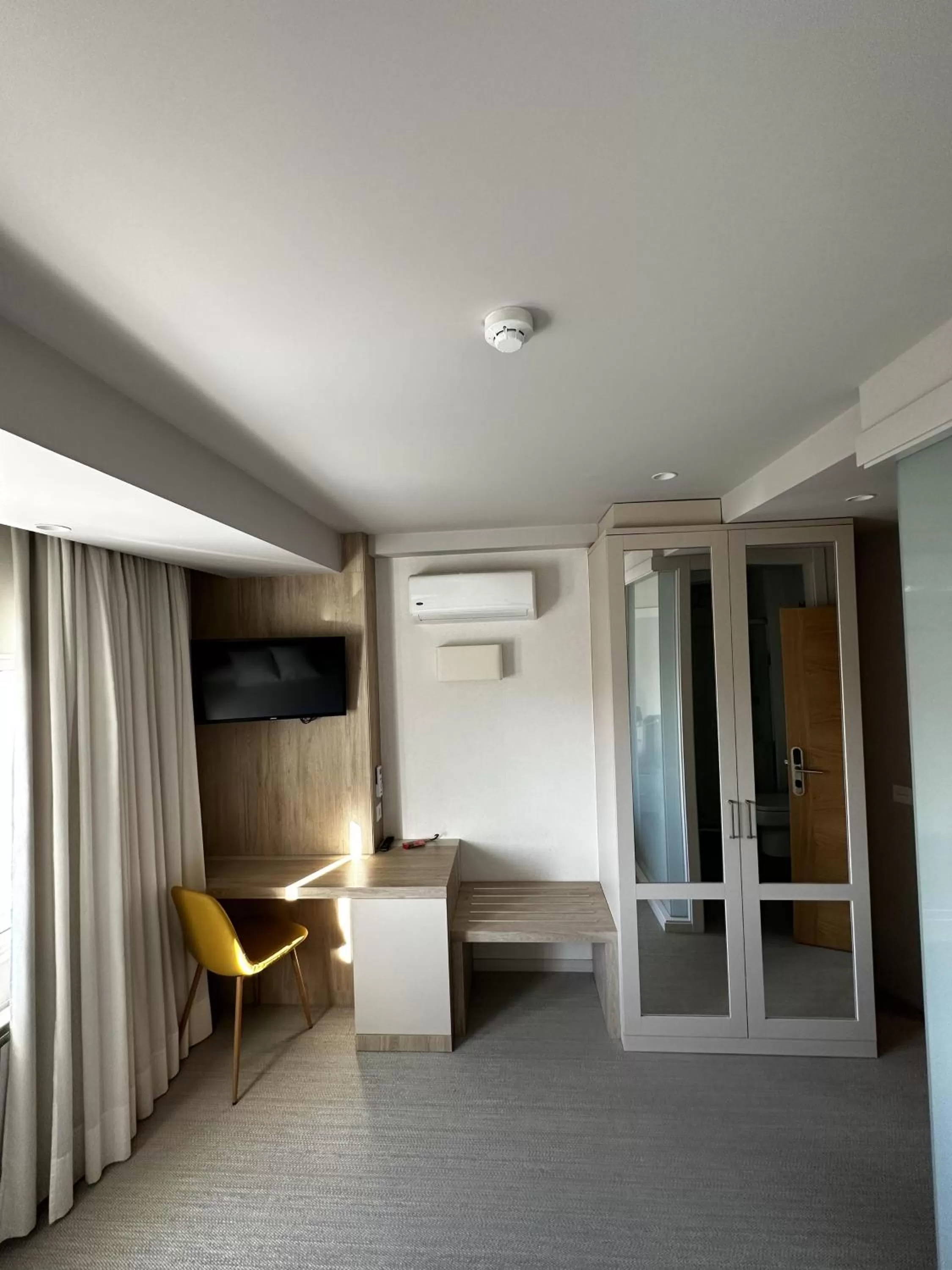 Seating area, Bed in Hotel San Luis