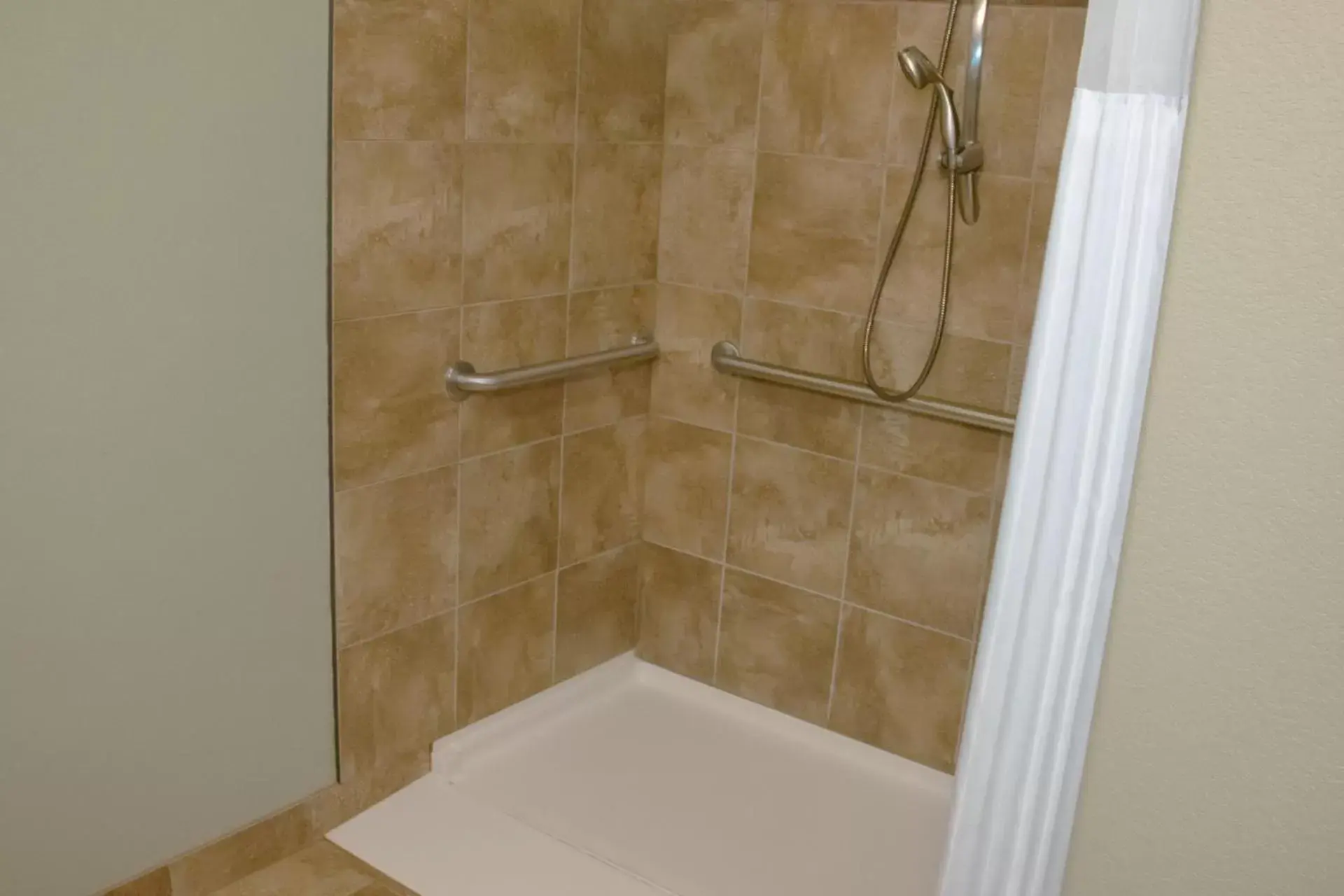 Shower, Bathroom in Expressway Suites of Grand Forks