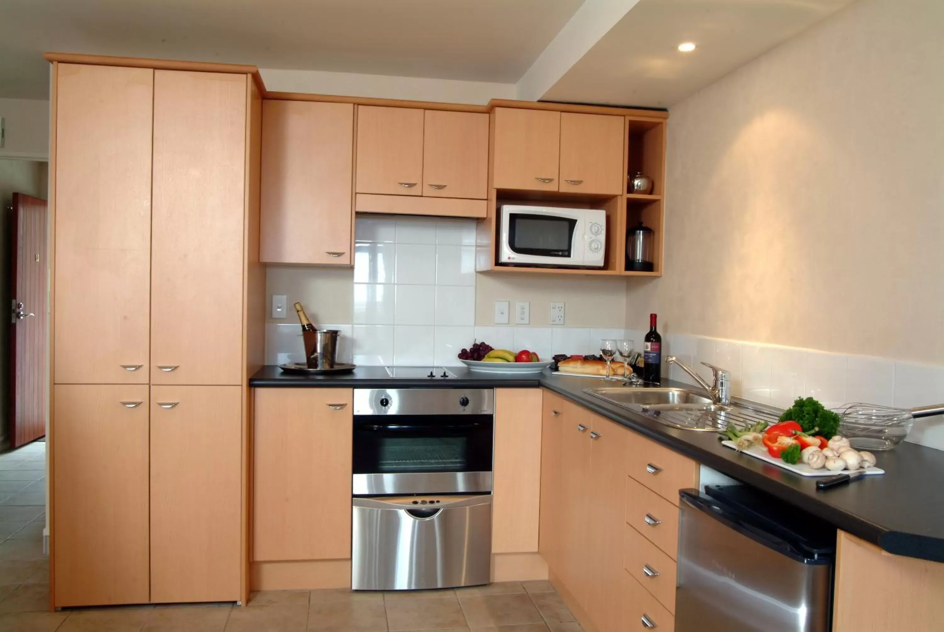 Kitchen or kitchenette, Kitchen/Kitchenette in Voyager Apartments Taupo