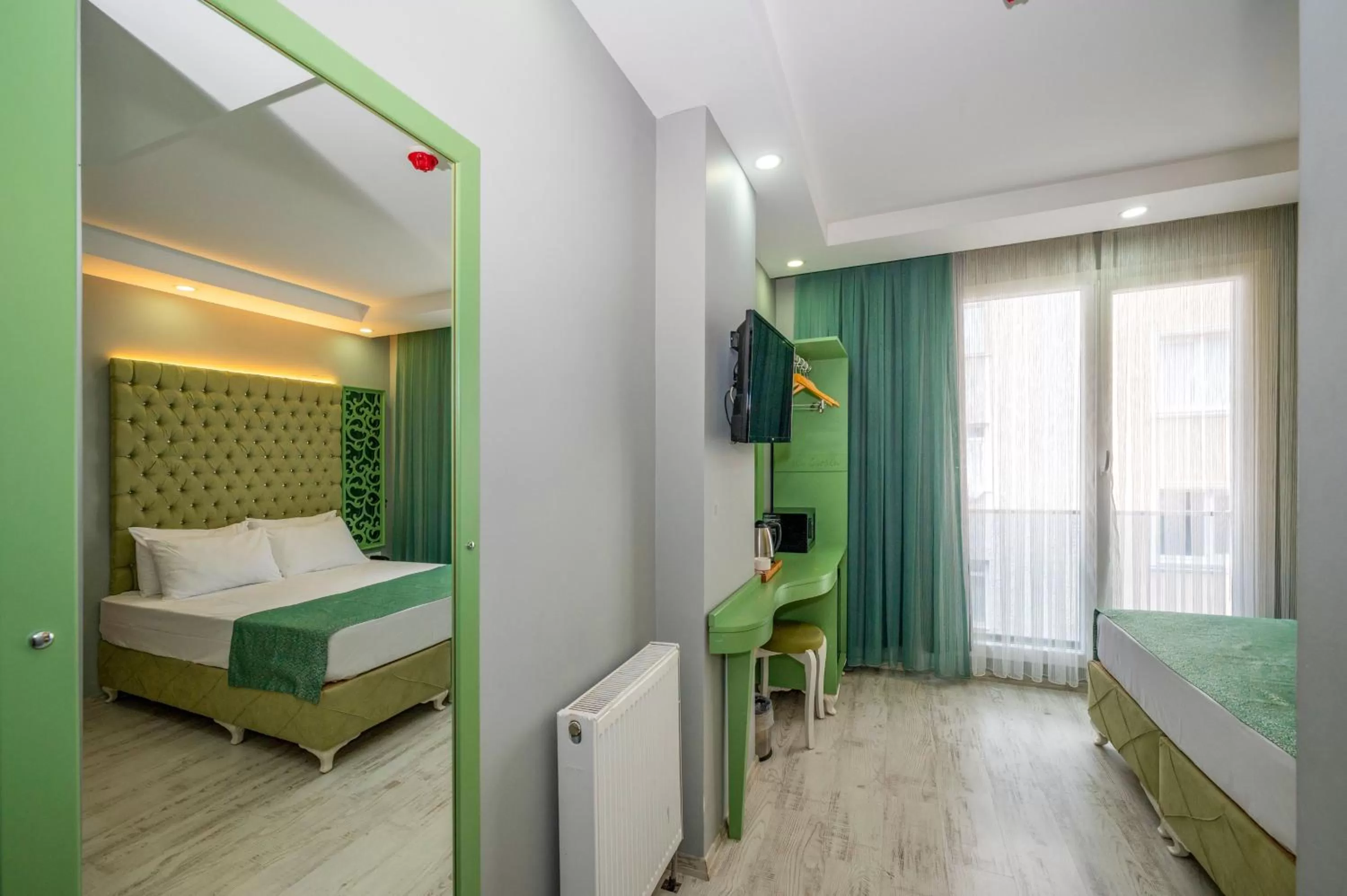 Photo of the whole room, Bed in Green Garden Hotel