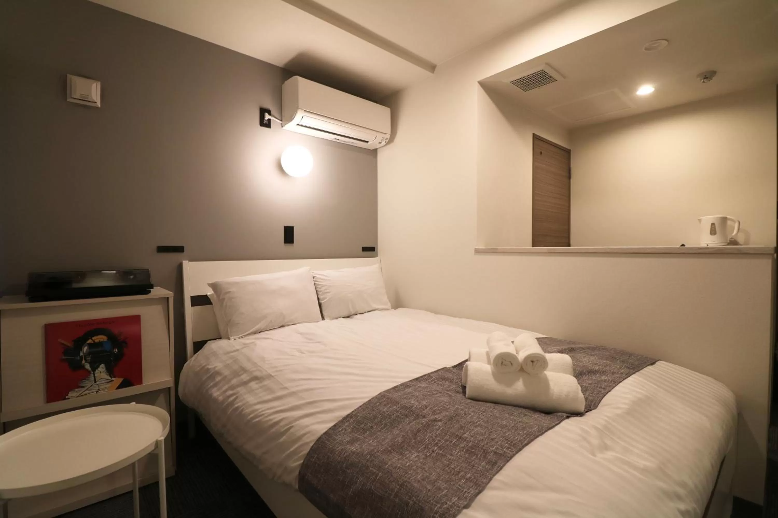 Bed in TAKETO STAY PREMIERE SAPPORO Eki