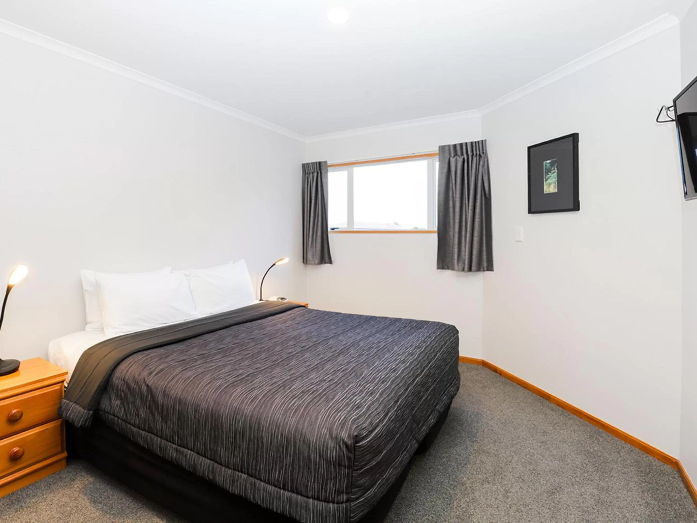 Bedroom, Bed in ASURE Chelsea Gateway Motor Lodge