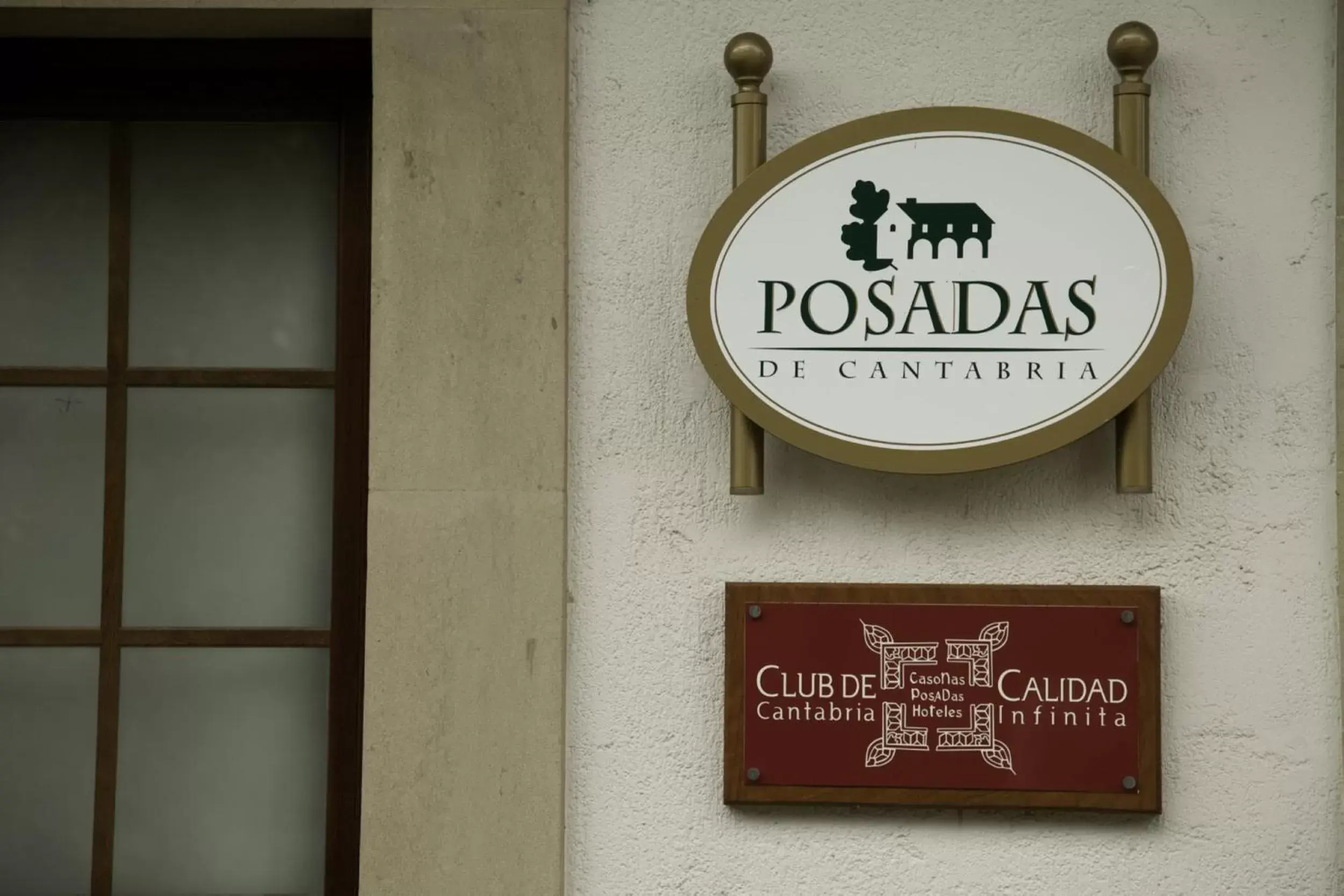 Property logo or sign in Hotel Posada La Robleda