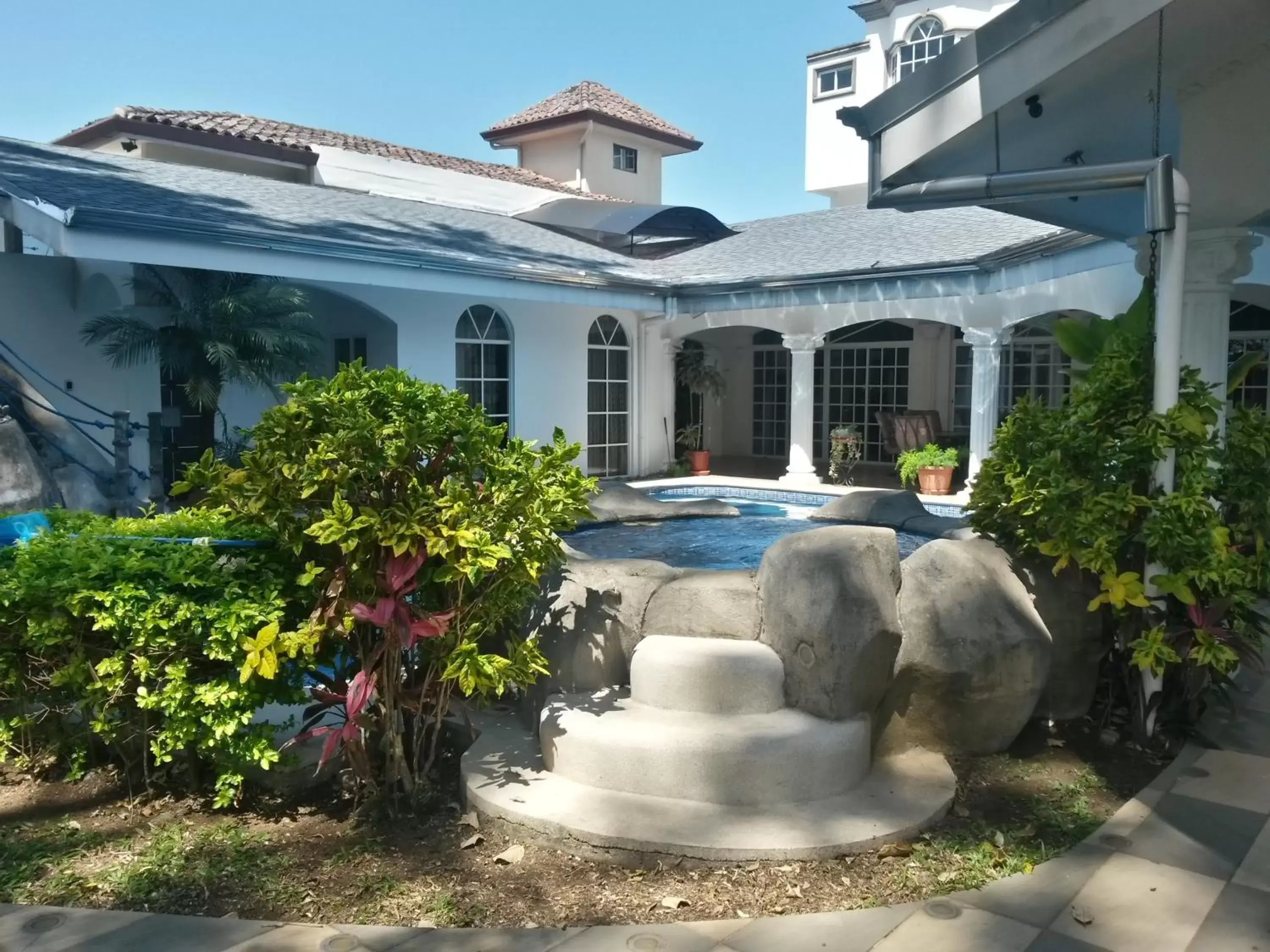 Swimming pool, Property Building in Alameda Cariari Boutique Hotel