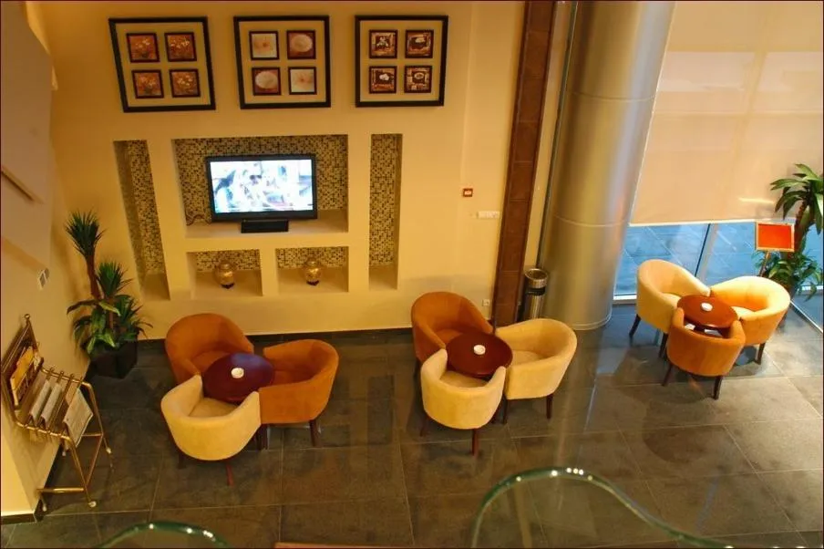Communal lounge/ TV room in Galaxy Amman Hotel