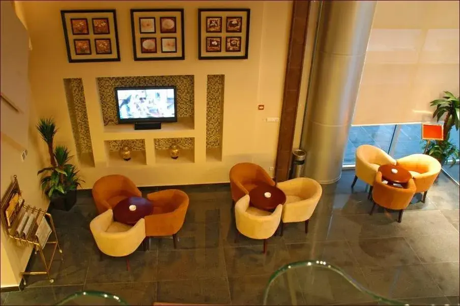 Communal lounge/ TV room in Galaxy Hotel Amman