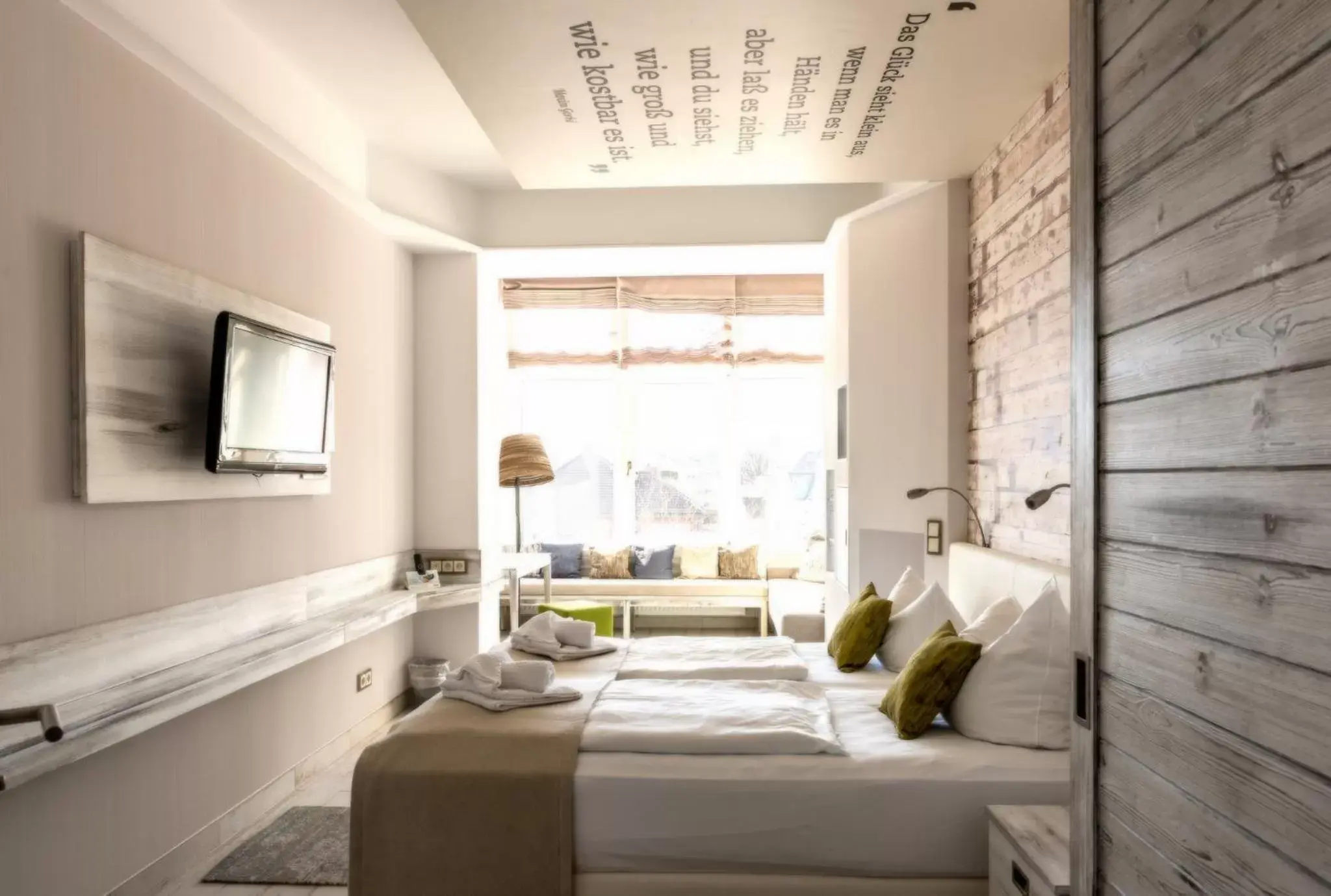 Photo of the whole room, Bed in SEETELHOTEL Strandhotel Atlantic