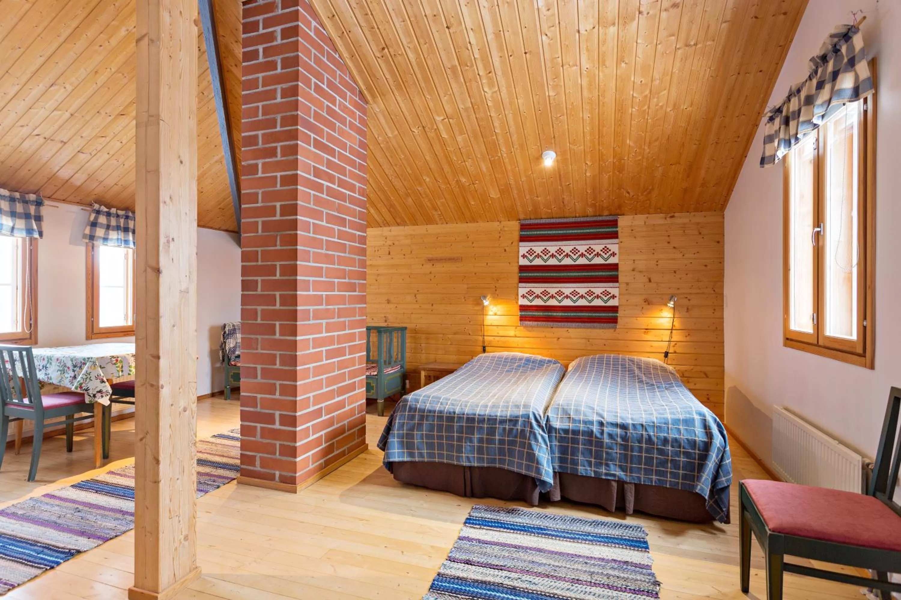 Photo of the whole room, Bed in Peltolan Luomutila