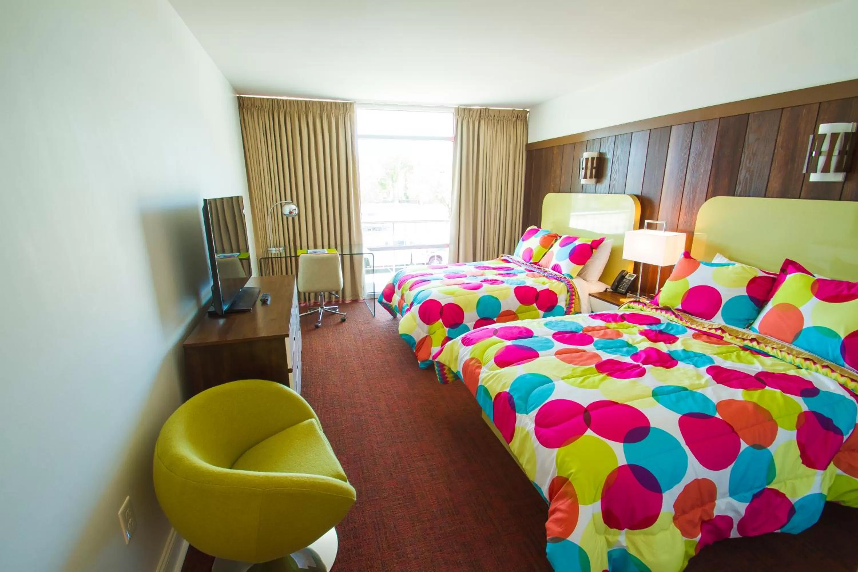 Bed in Mother Earth Motor Lodge