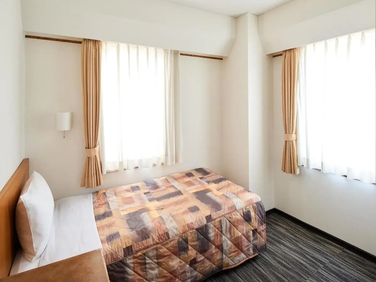 Bed in Marroad Inn Akasaka