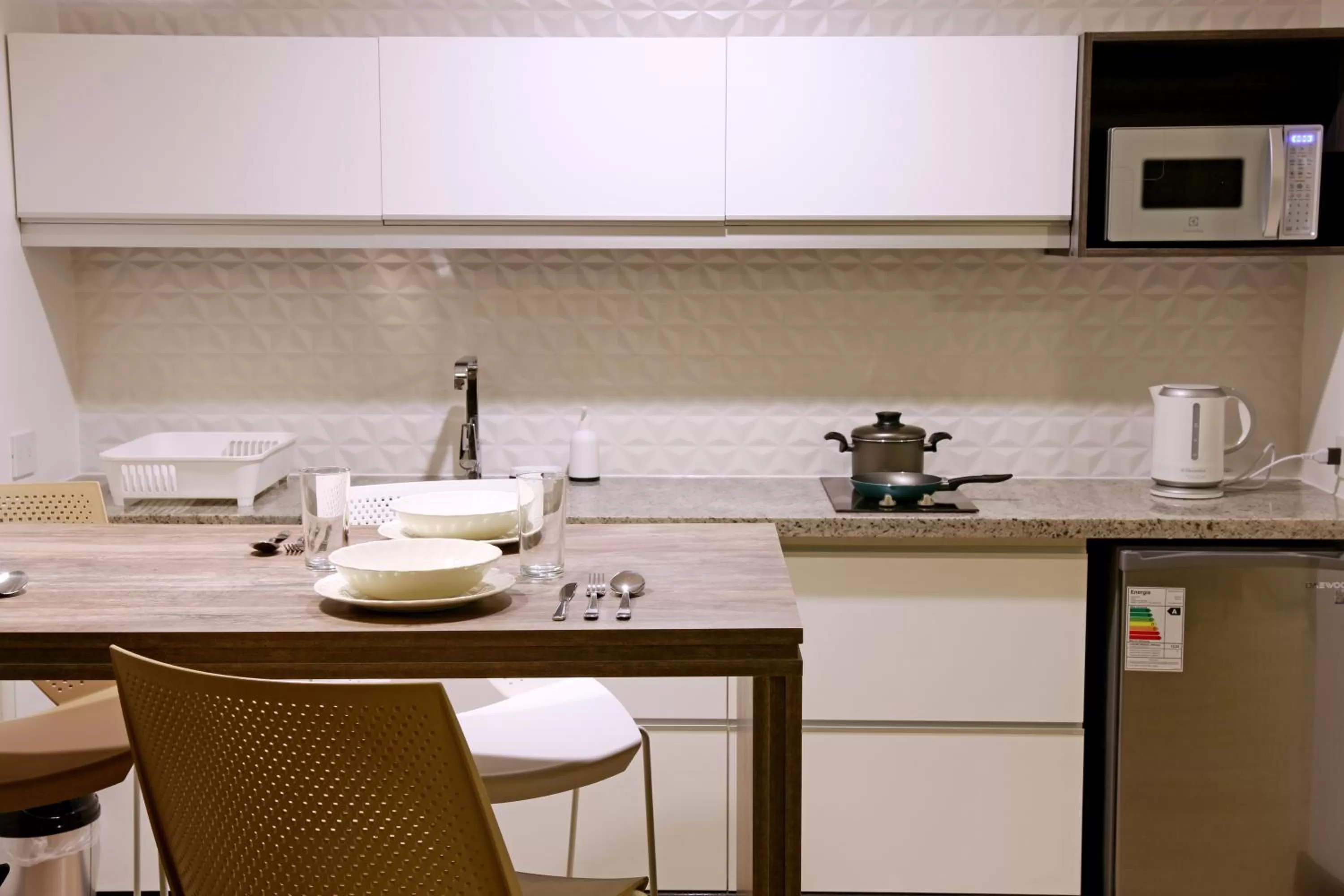 Kitchen or kitchenette in Urban Suites Apart Hotel