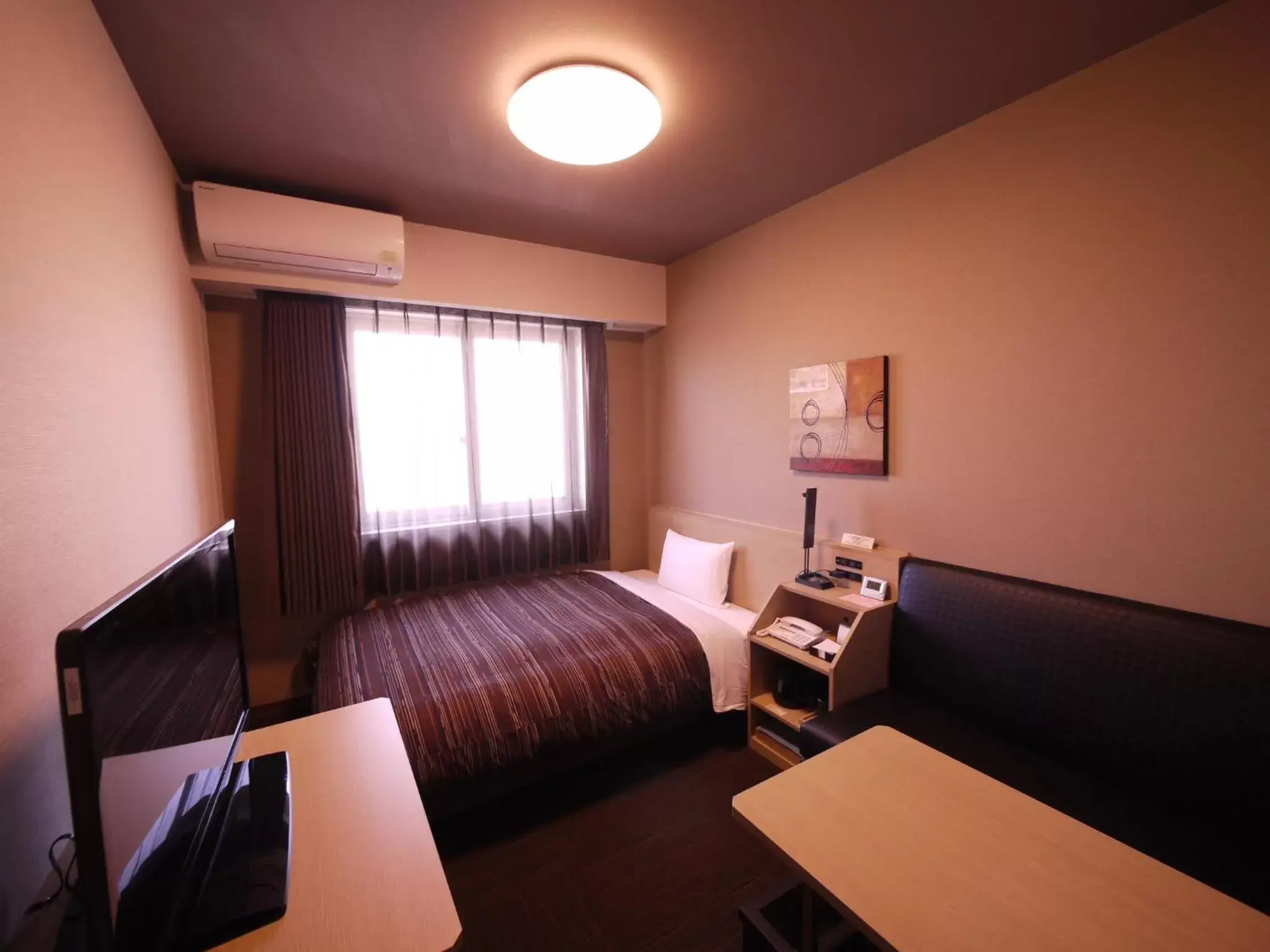 Photo of the whole room, Bed in Route Inn Grantia Komatsu Airport