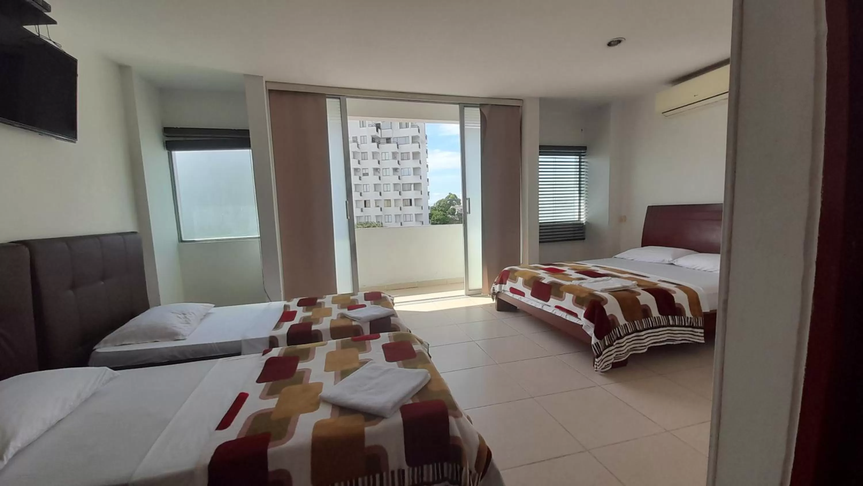 Bed in Hotel Santorini Neiva