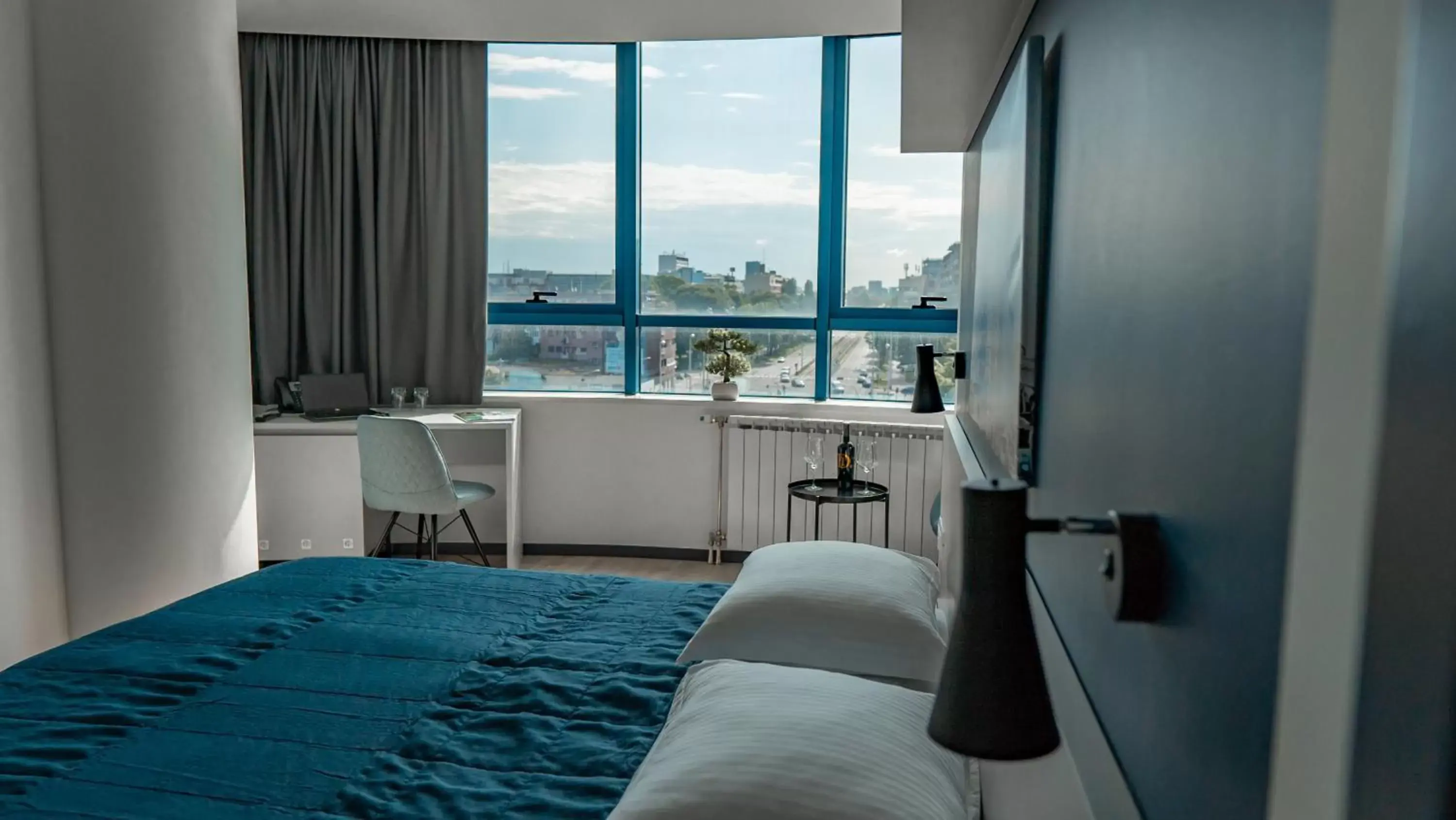 Seating area, Bed in Hotel Blue Seating area, Bed in Hotel Blue