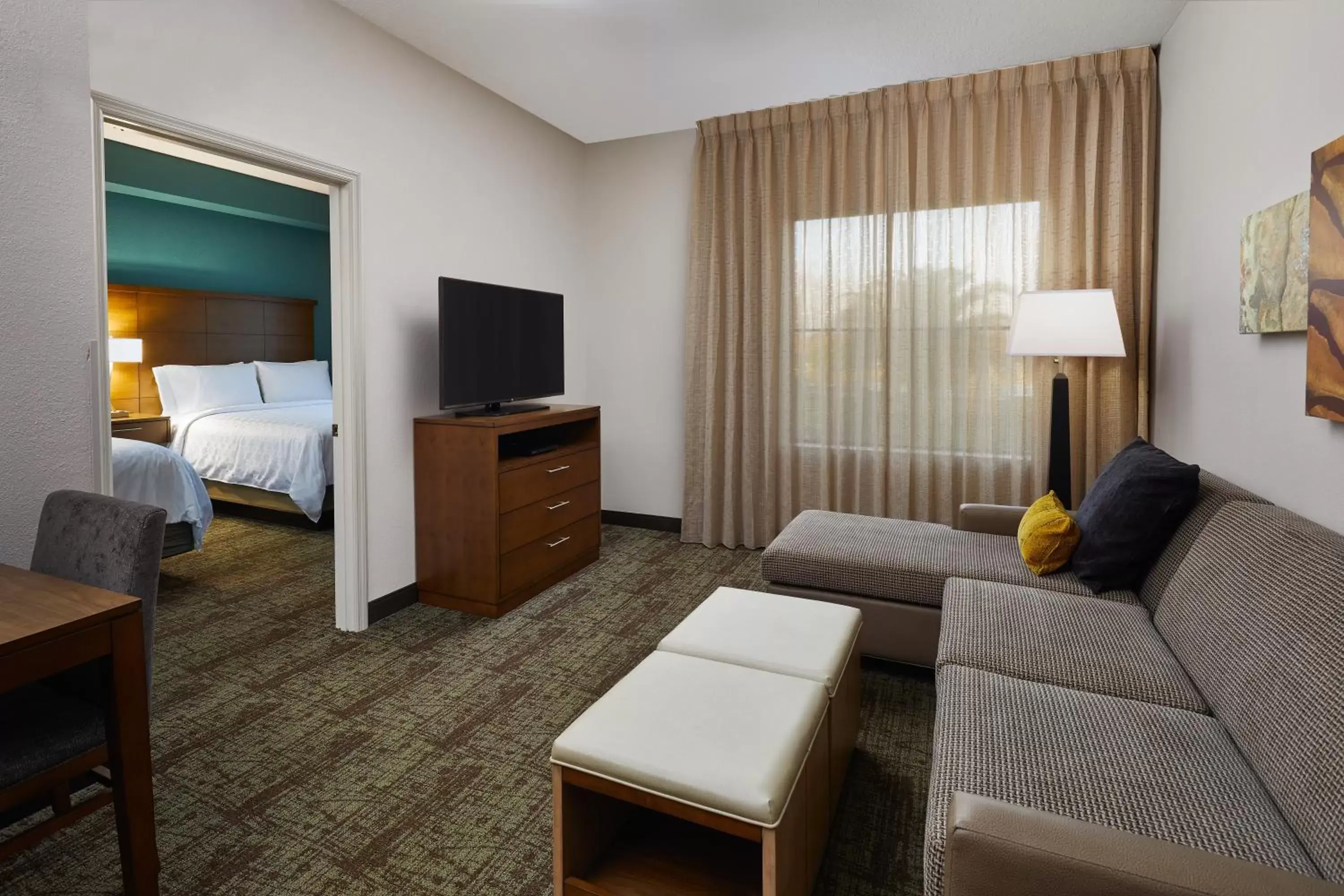 Photo of the whole room, Seating Area in Staybridge Suites Orlando South, an IHG Hotel