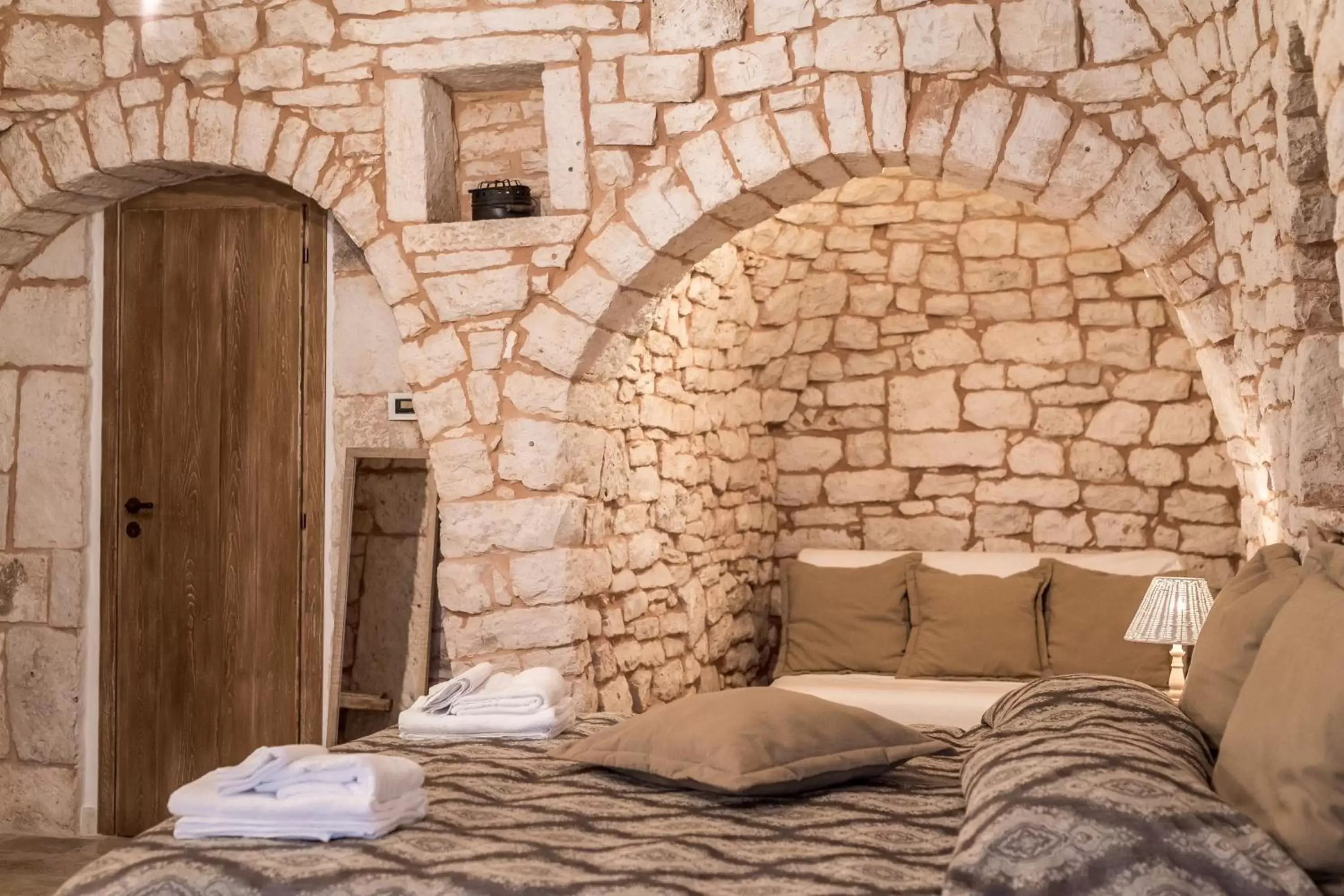 Bed in Trulli Antichi Mestieri - Widespread Trulli in the historic center