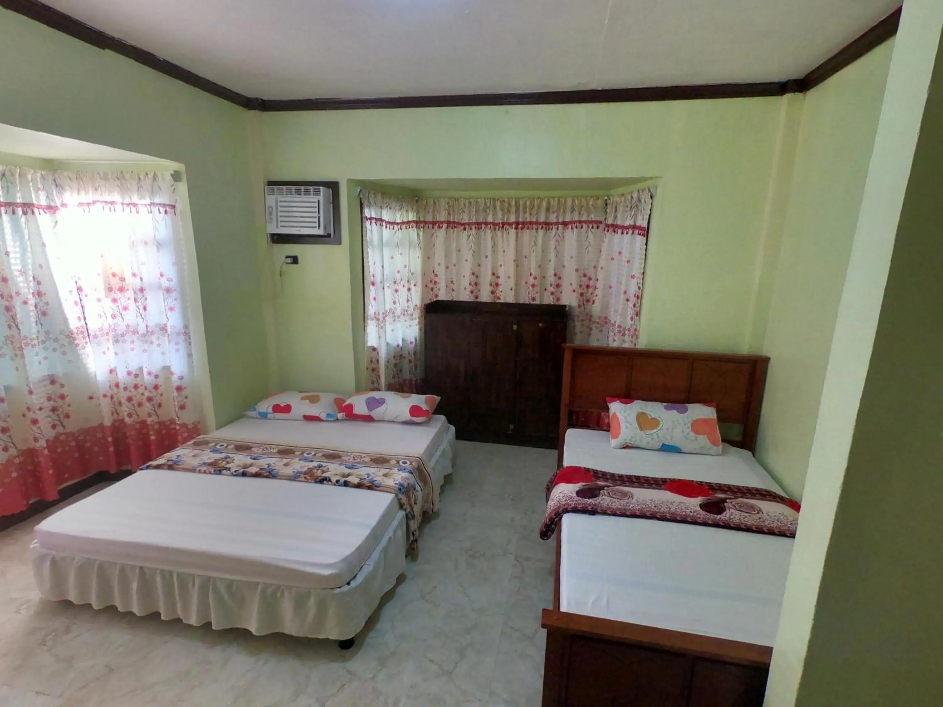 Bed in Bohol Sea Breeze Cottages and Resort