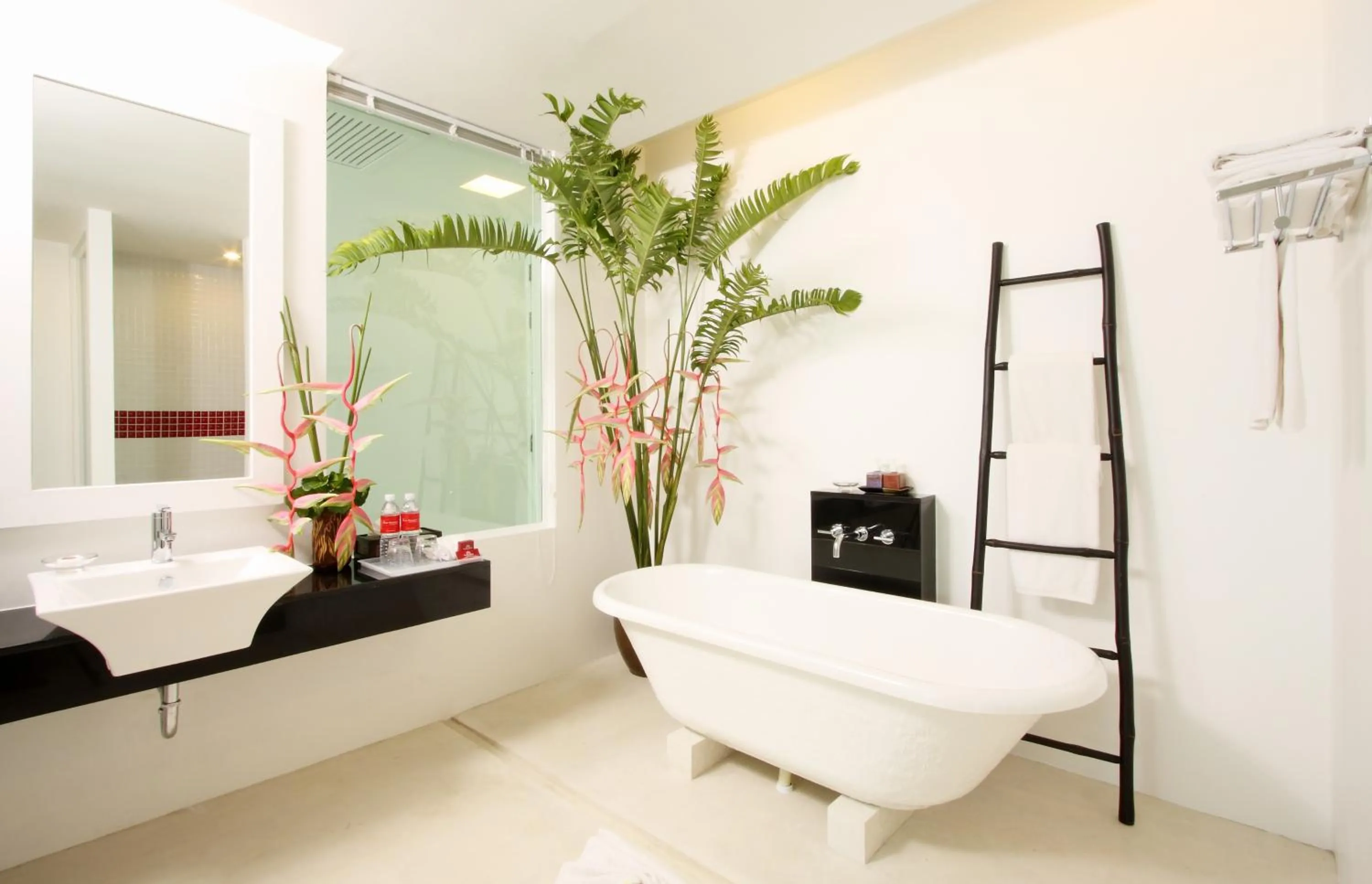 Bathroom in The Old Phuket - Karon Beach Resort - SHA Plus