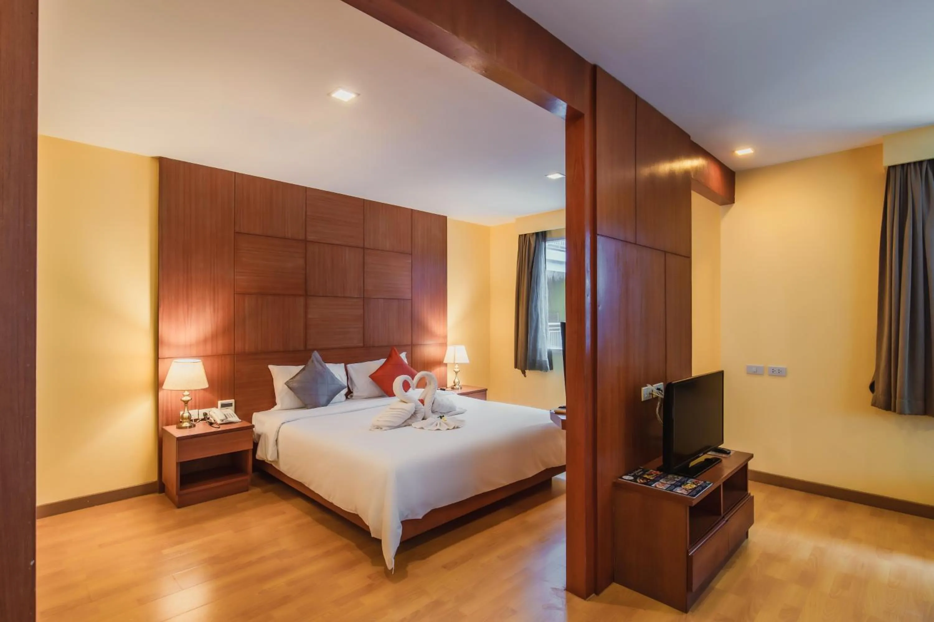 Bed in Elite Suites Patong