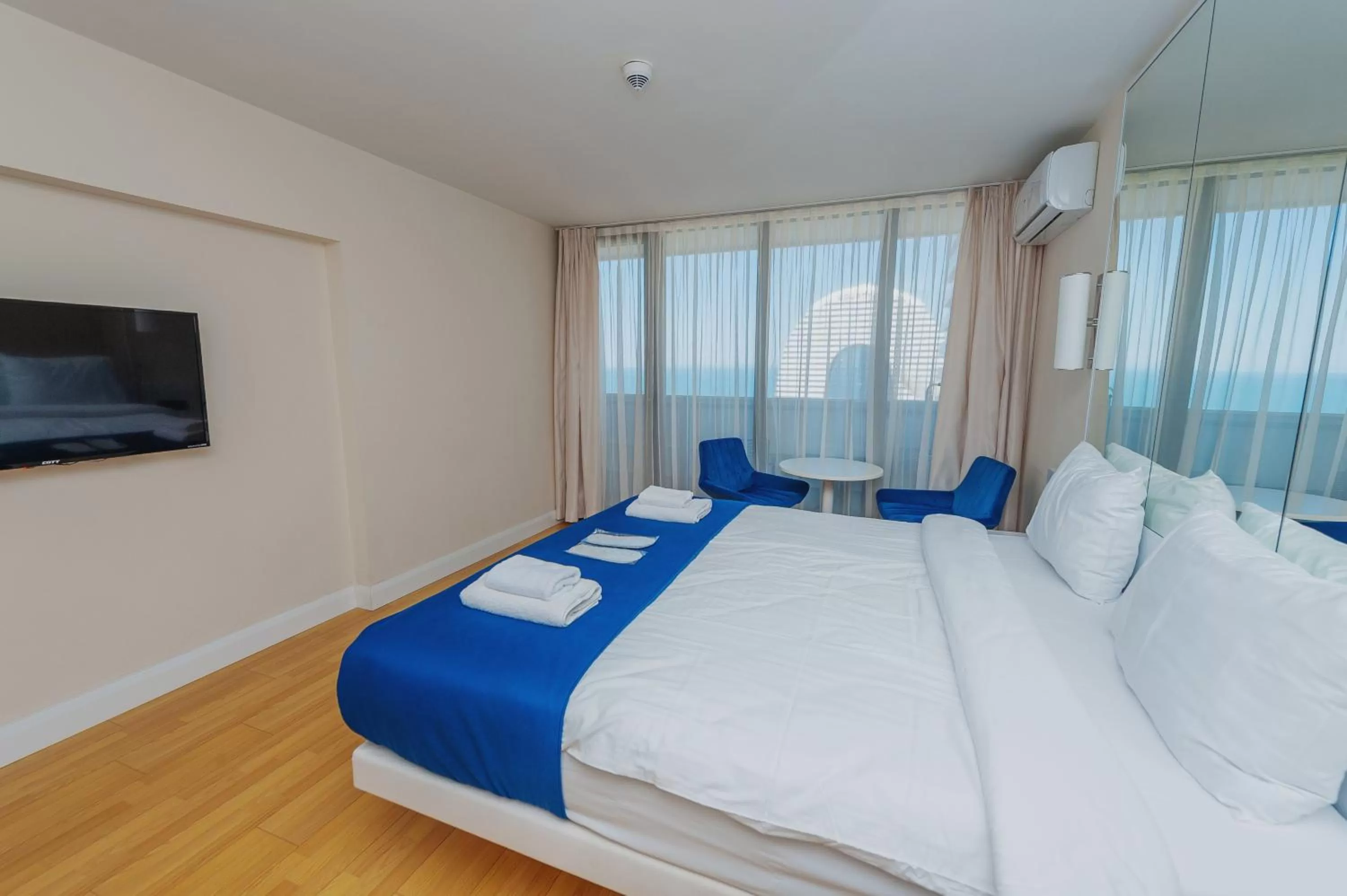 Bed in Orbi City Luxury Suite