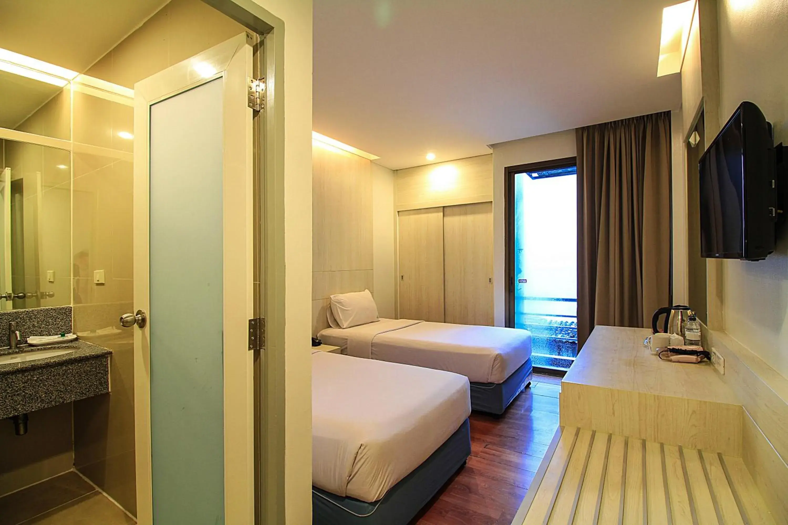 Photo of the whole room, Bed in Ten Stars Hotel Pratunam