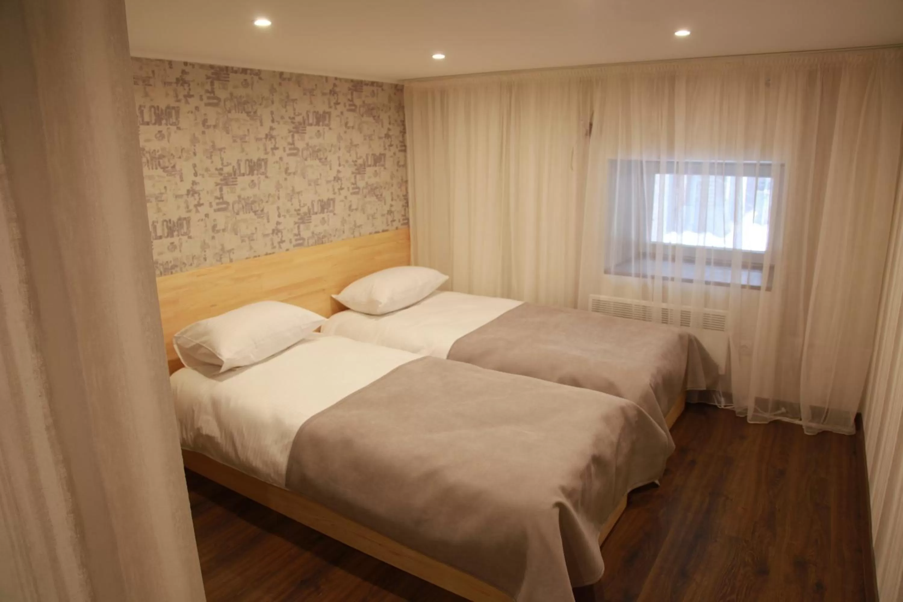 Bed in WINE & ROSE BOUTIQUE HOTEL