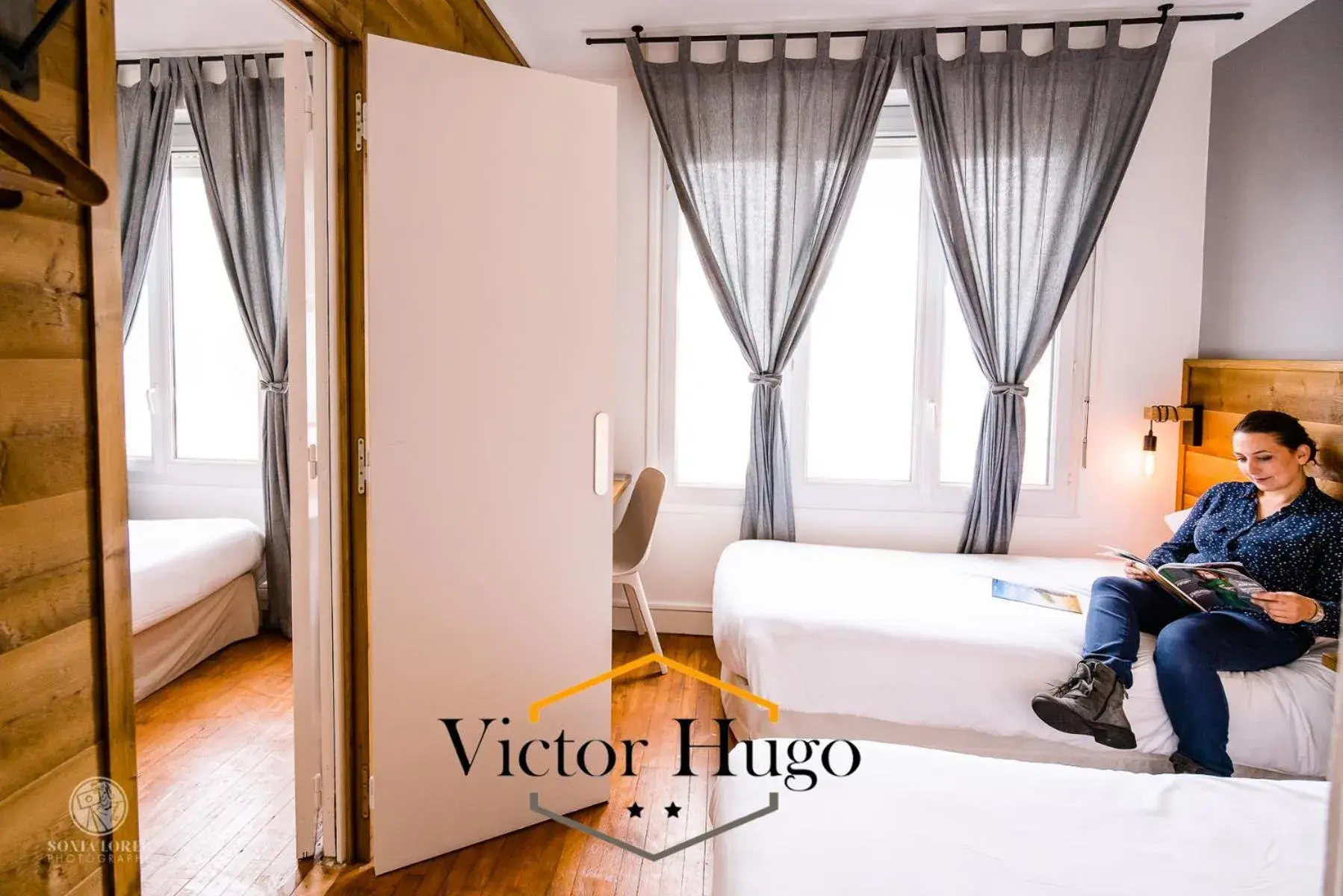 Bed in Hôtel Victor Hugo Lorient