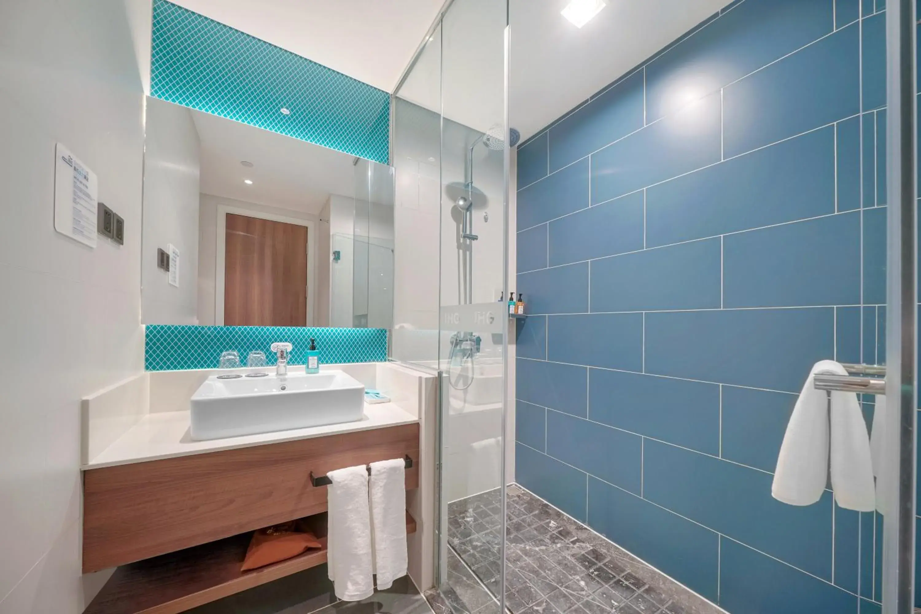 Shower, Bathroom in Holiday Inn Express - Harbin Songbei New District, an IHG Hotel