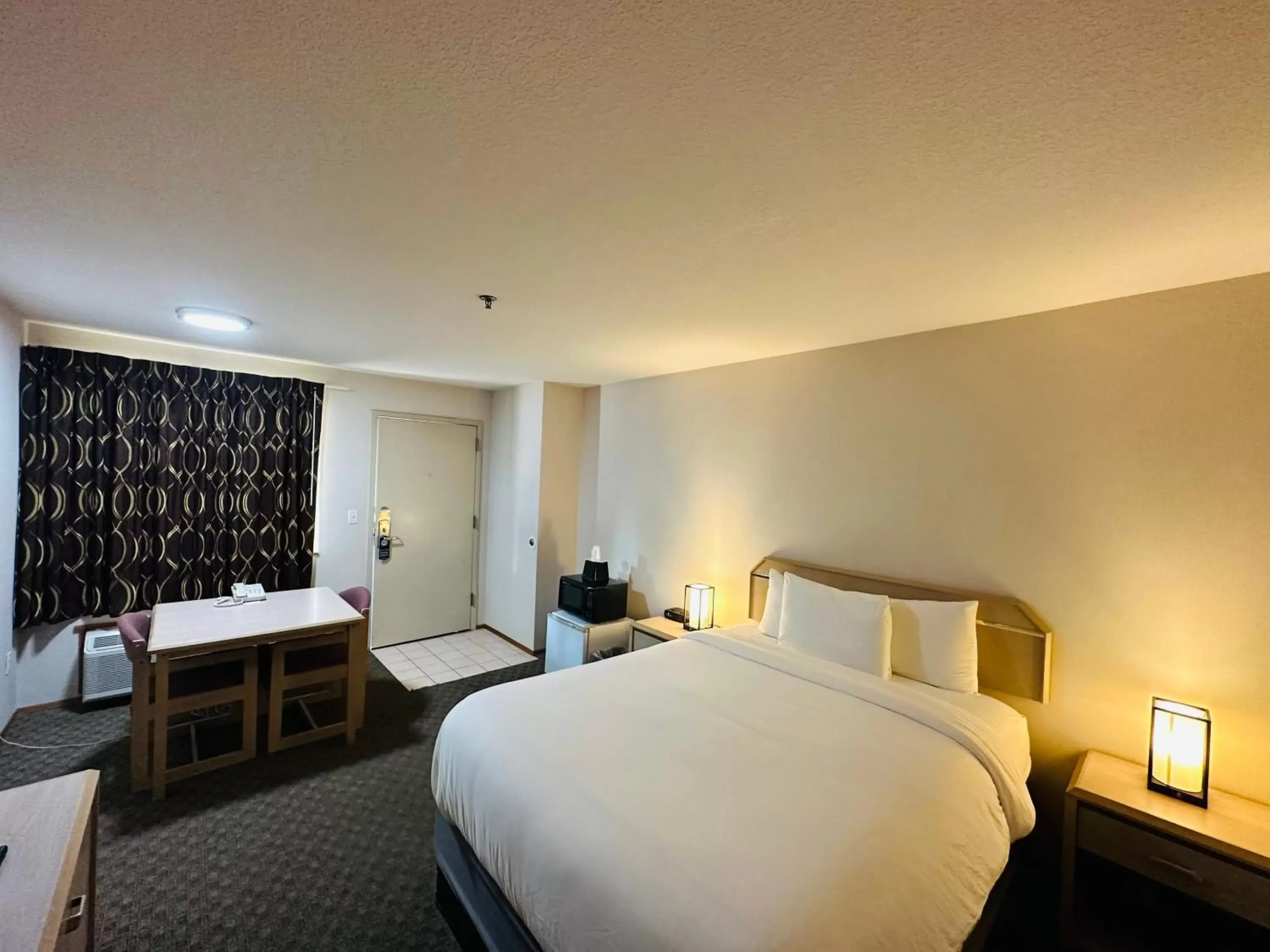 Bed in Timberland Inn & Suites Bed in Timberland Inn & Suites