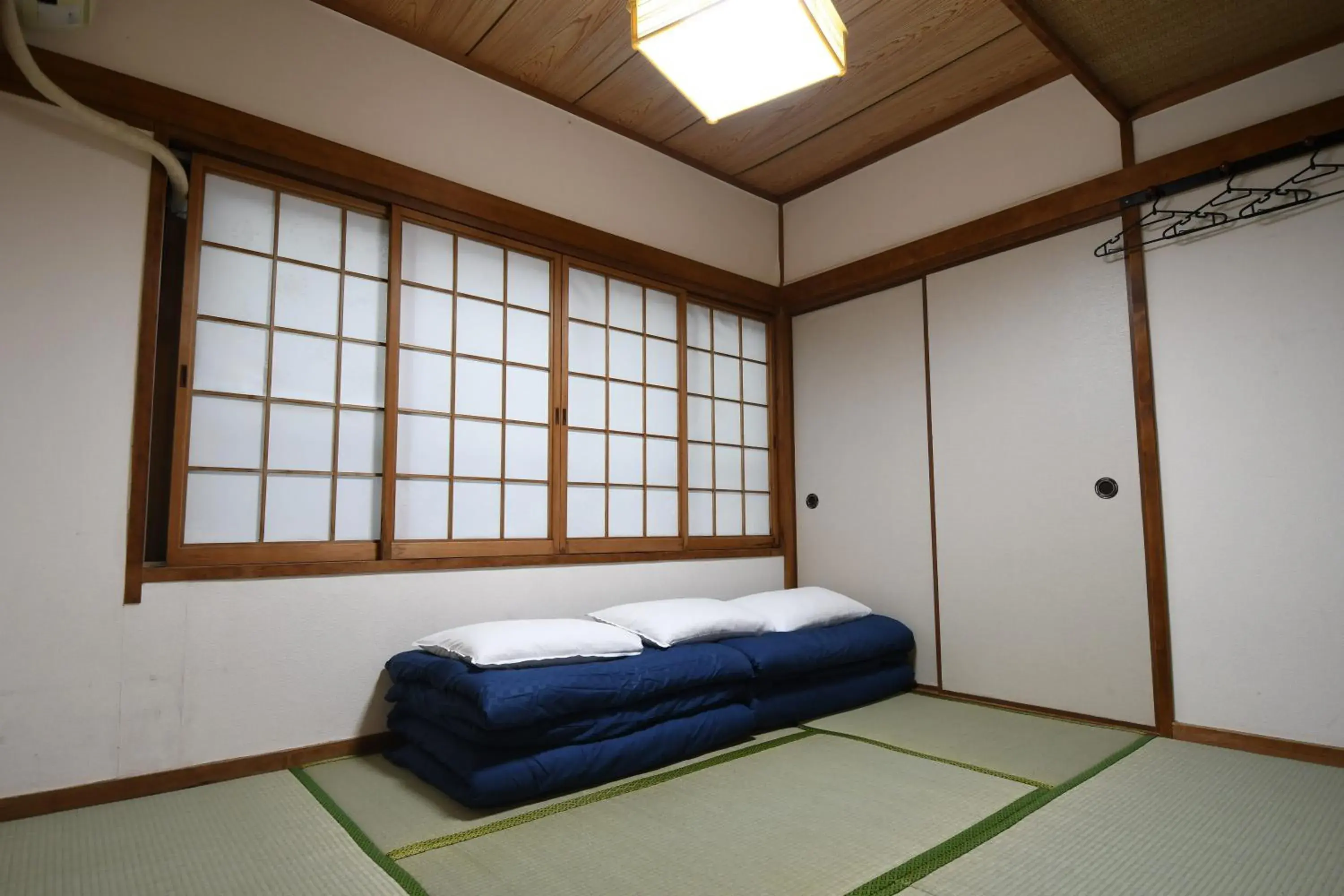 Bed in Onsen yado Hamayu Nagi