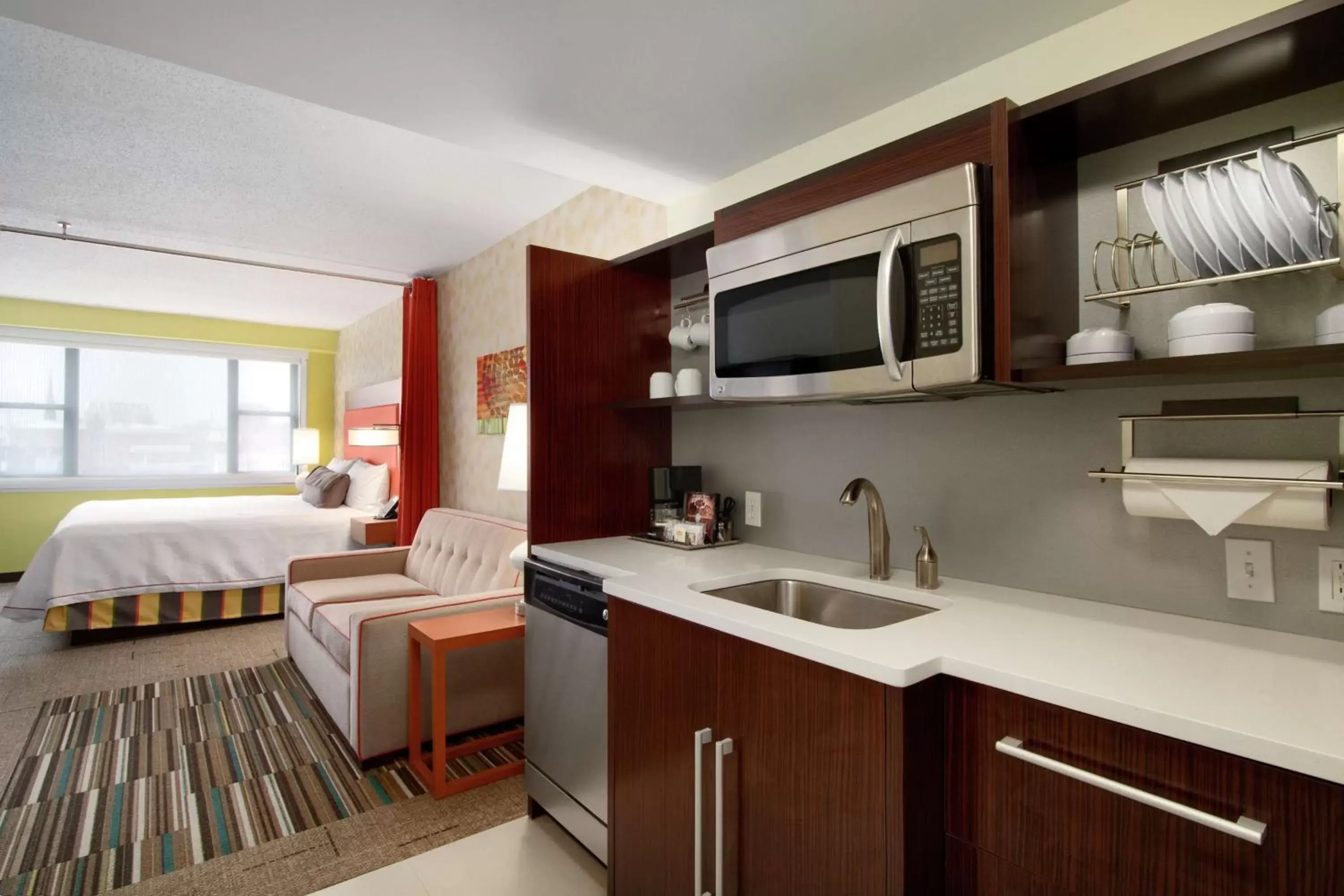 Living room, Kitchen/Kitchenette in Home2 Suites by Hilton Baltimore Downtown