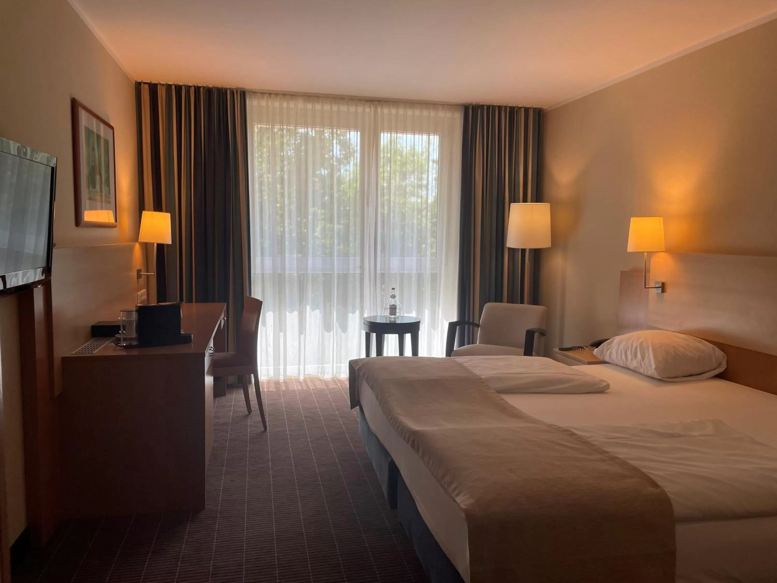 Photo of the whole room, Bed in Mercure Hotel Schweinfurt Maininsel