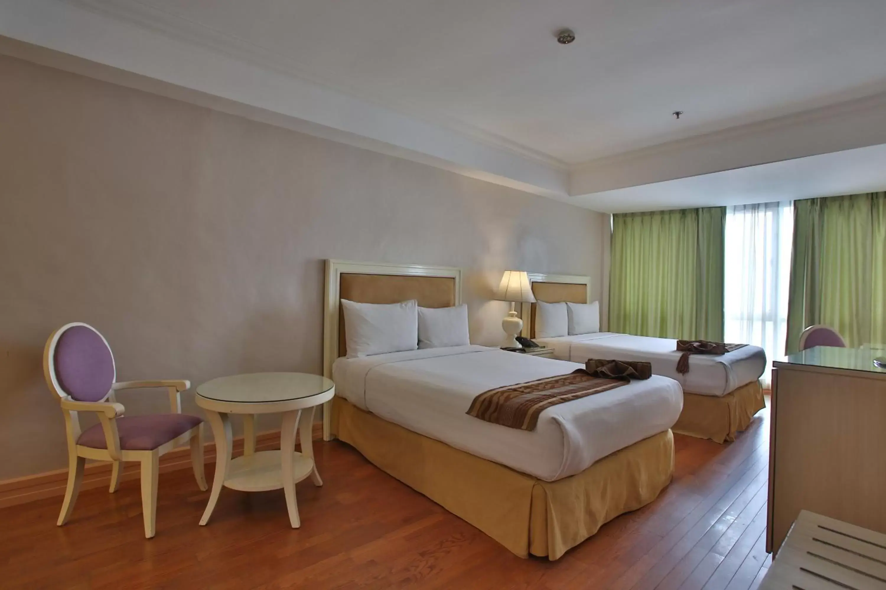 Bed in Crown Regency Hotel & Towers