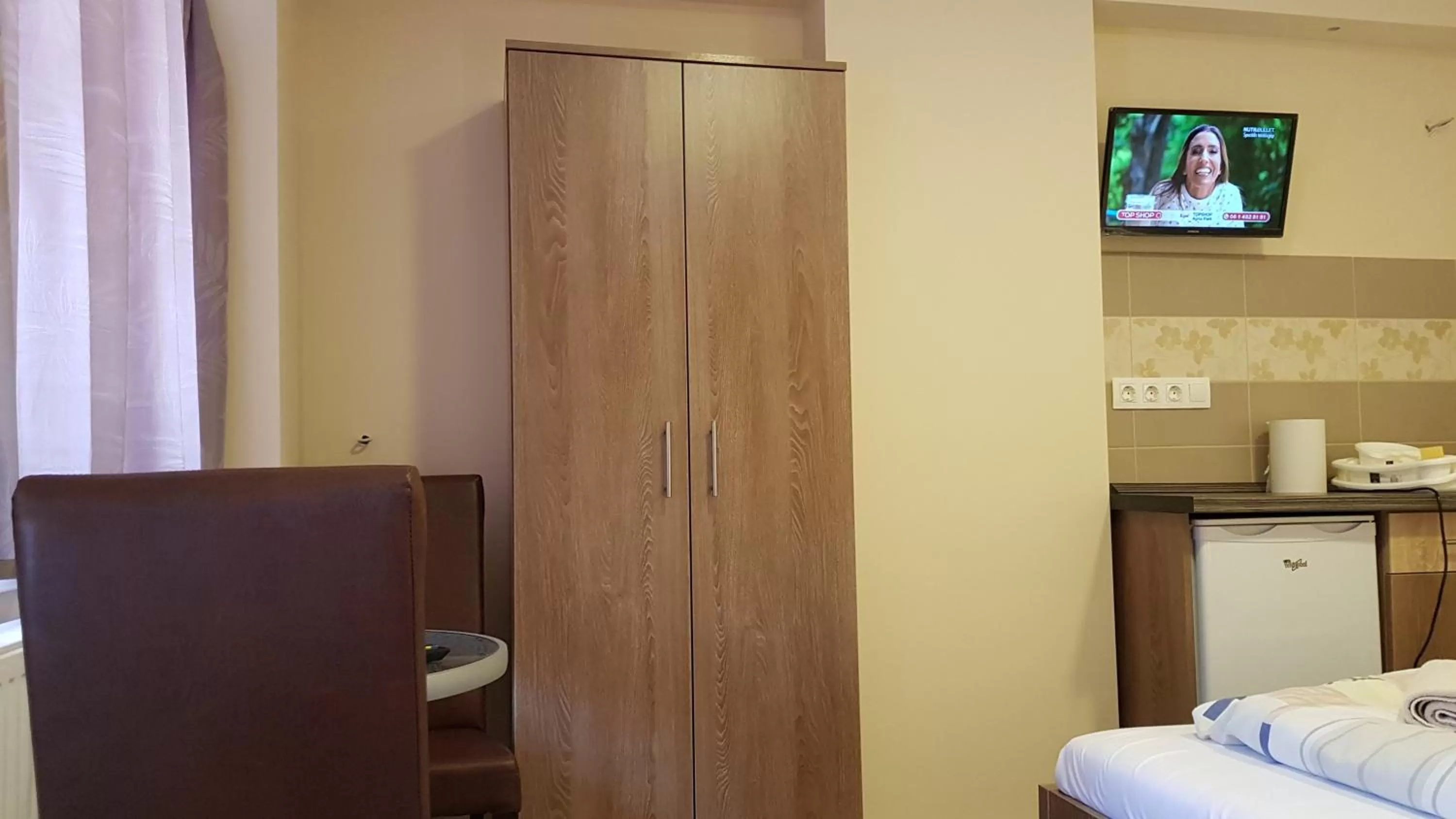 Bed in Central Panzió Gyula