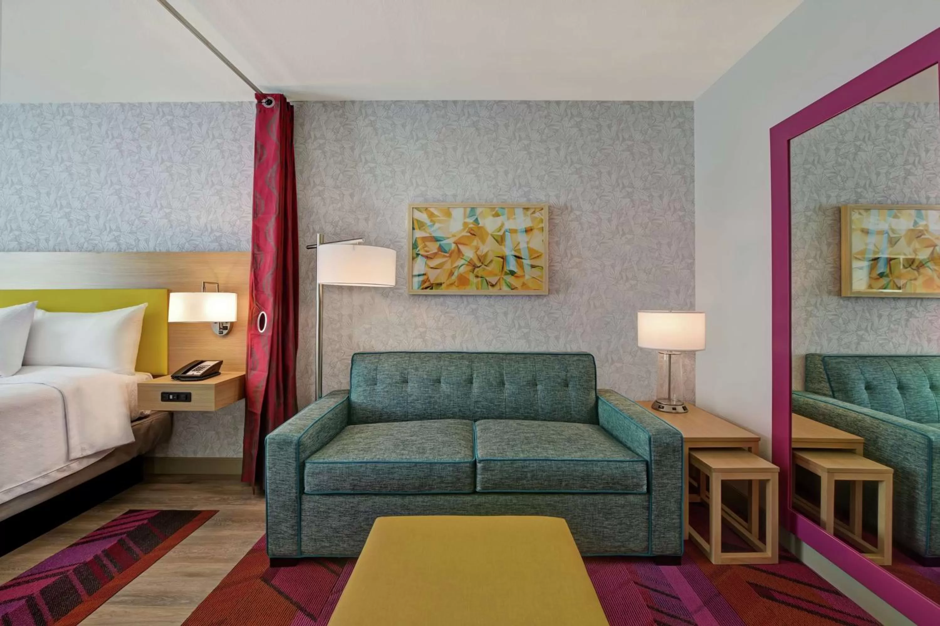 Living room, Bed in Home2 Suites By Hilton West Palm Beach Airport