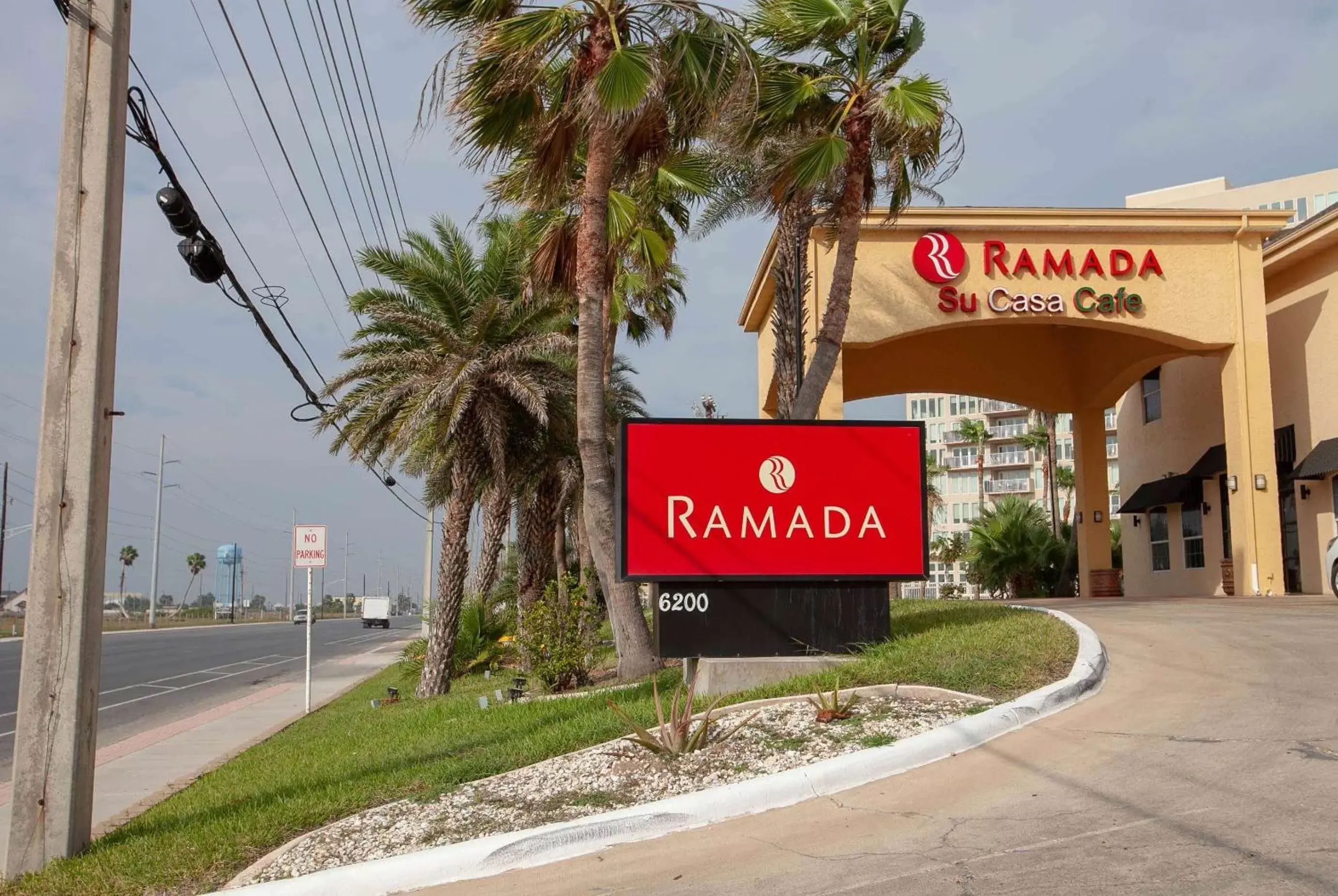 Property building, Property Logo/Sign in Ramada by Wyndham & Suites South Padre Island