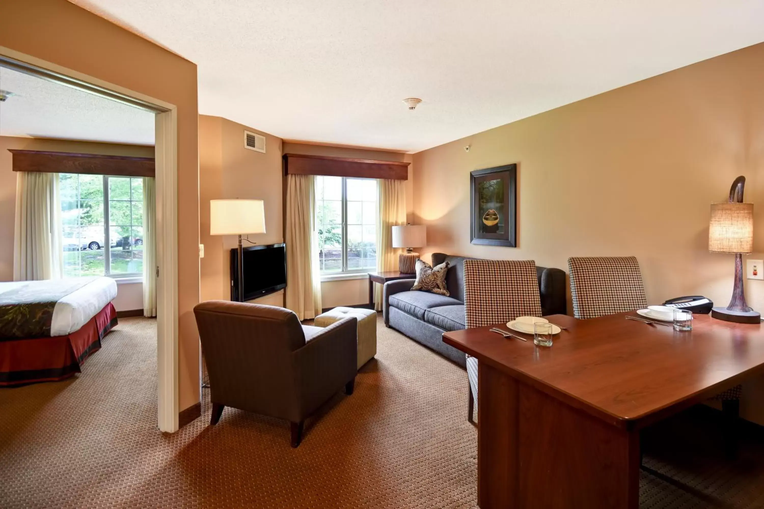 Photo of the whole room, Seating Area in GrandStay Hotel & Suites La Crosse