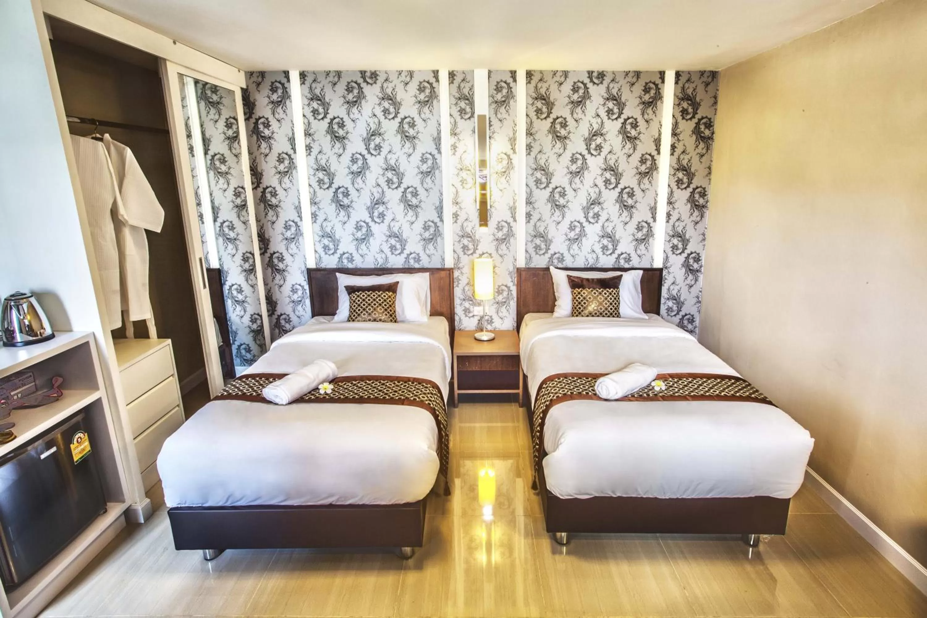 Photo of the whole room, Bed in The Aim Sathorn Hotel