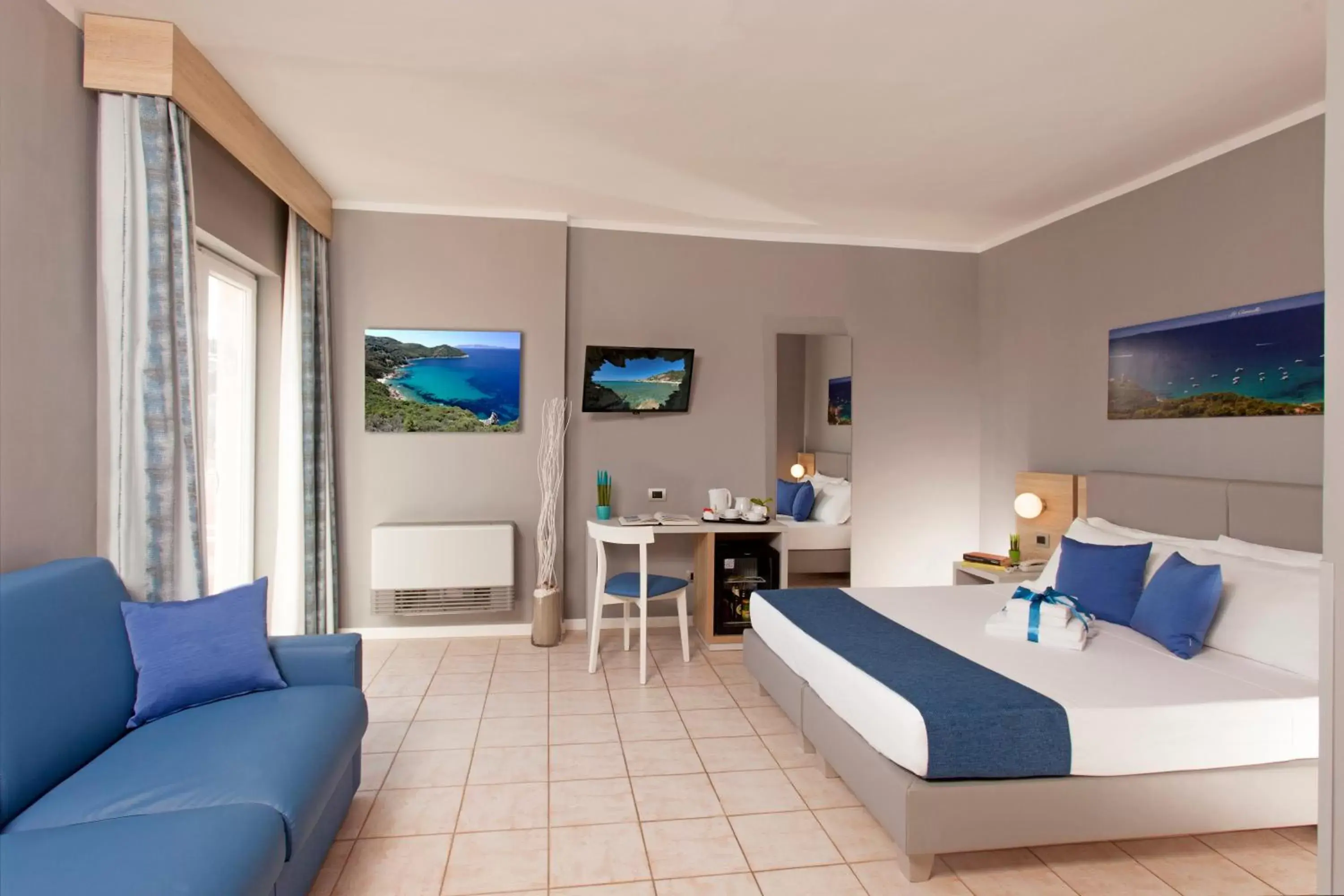 Bedroom, Seating Area in Bike&Boat Argentario Hotel