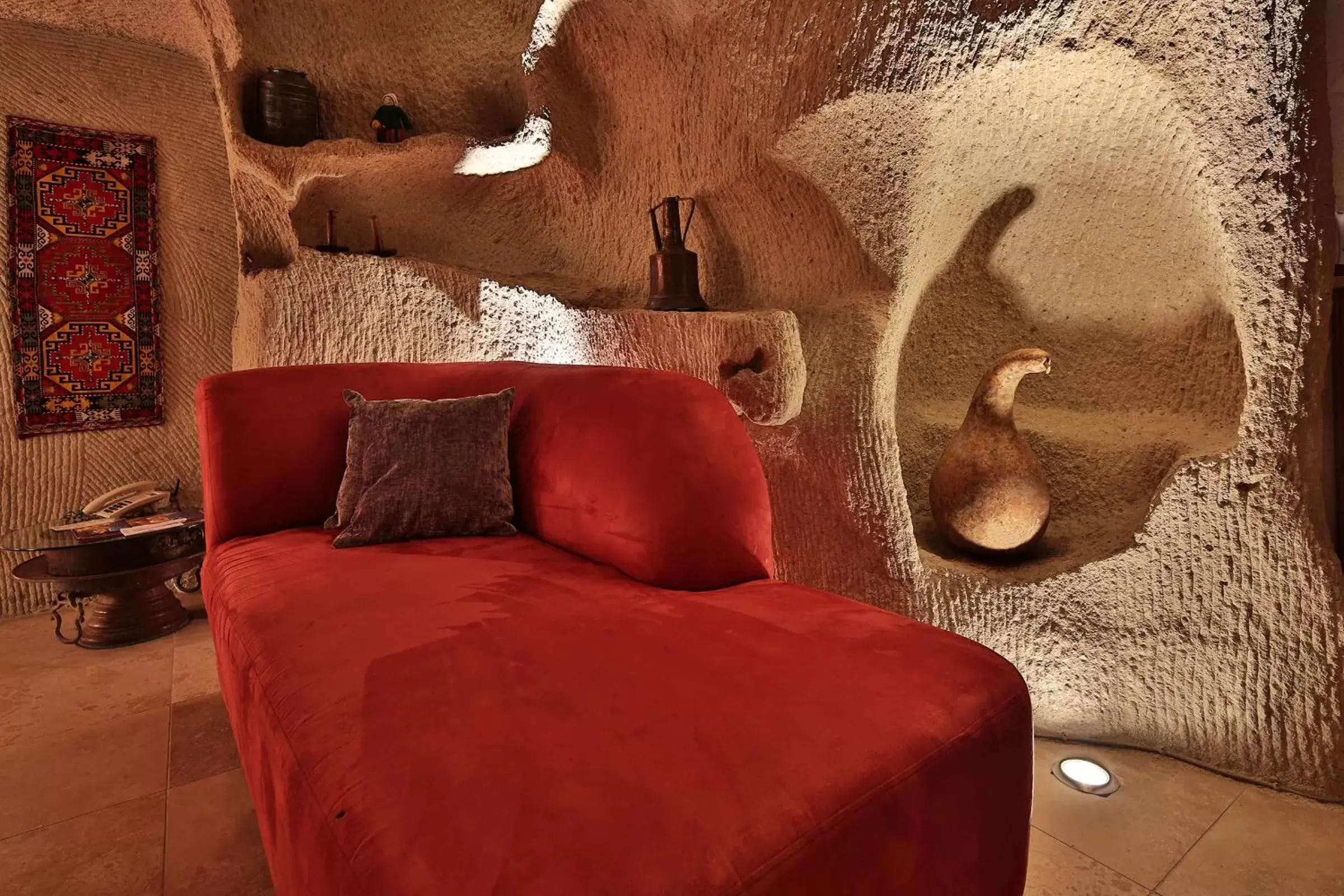 Living room, Bed in Cappadocia Cave Suites