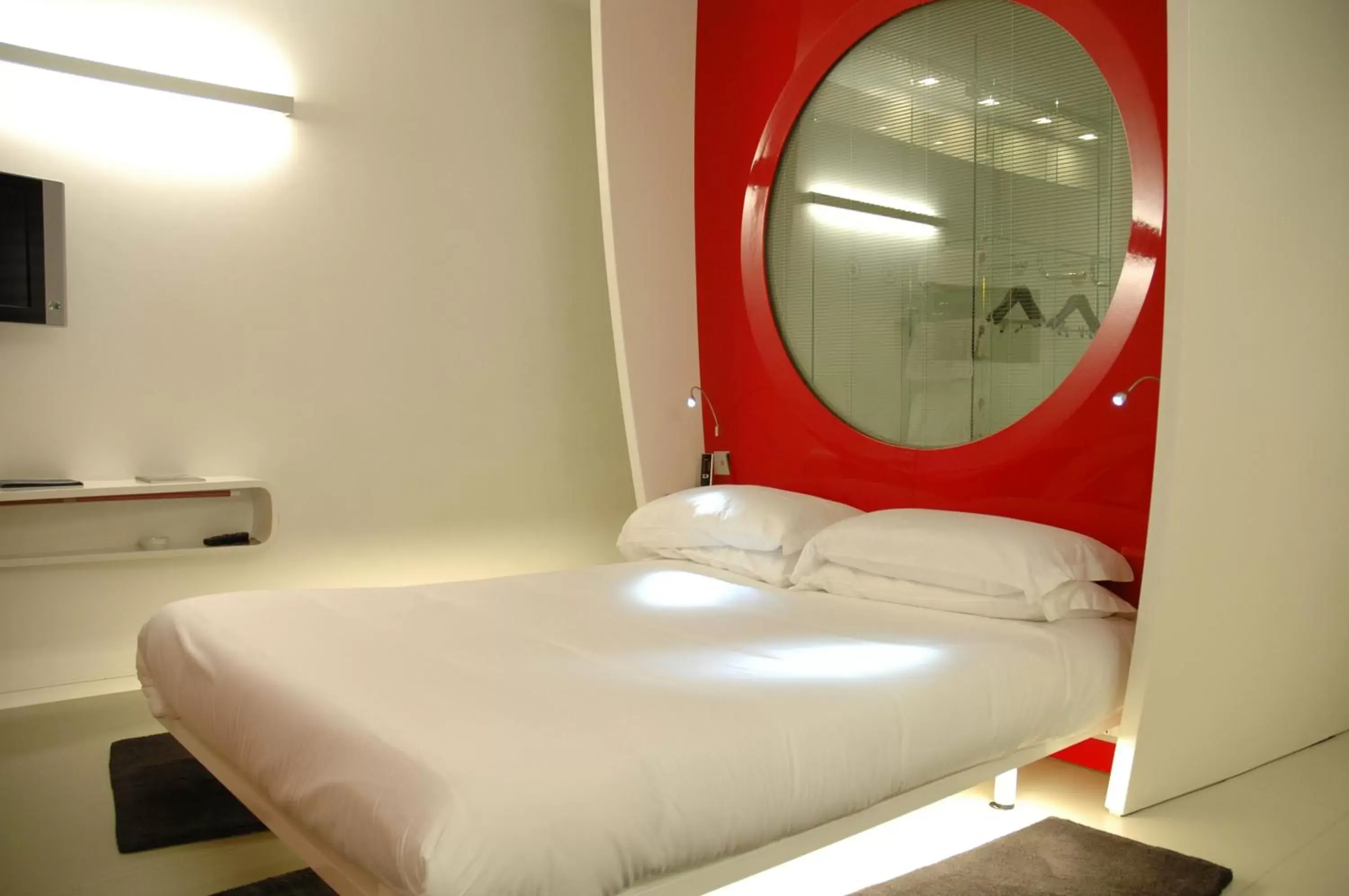 Bed in DuoMo Hotel