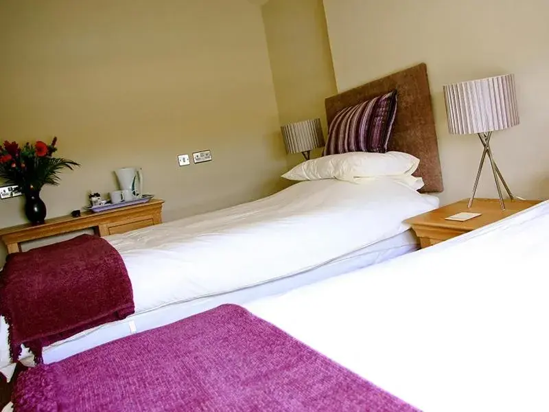 Bed in The Arun View Inn