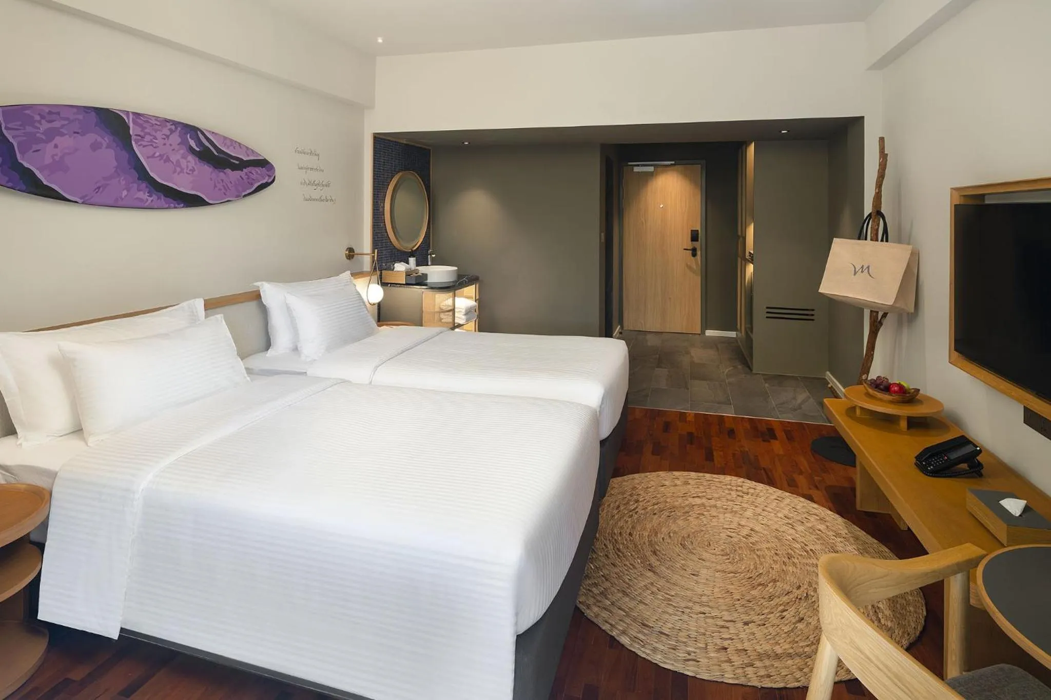 Bed in Mercure Rayong Lomtalay Villas & Resort