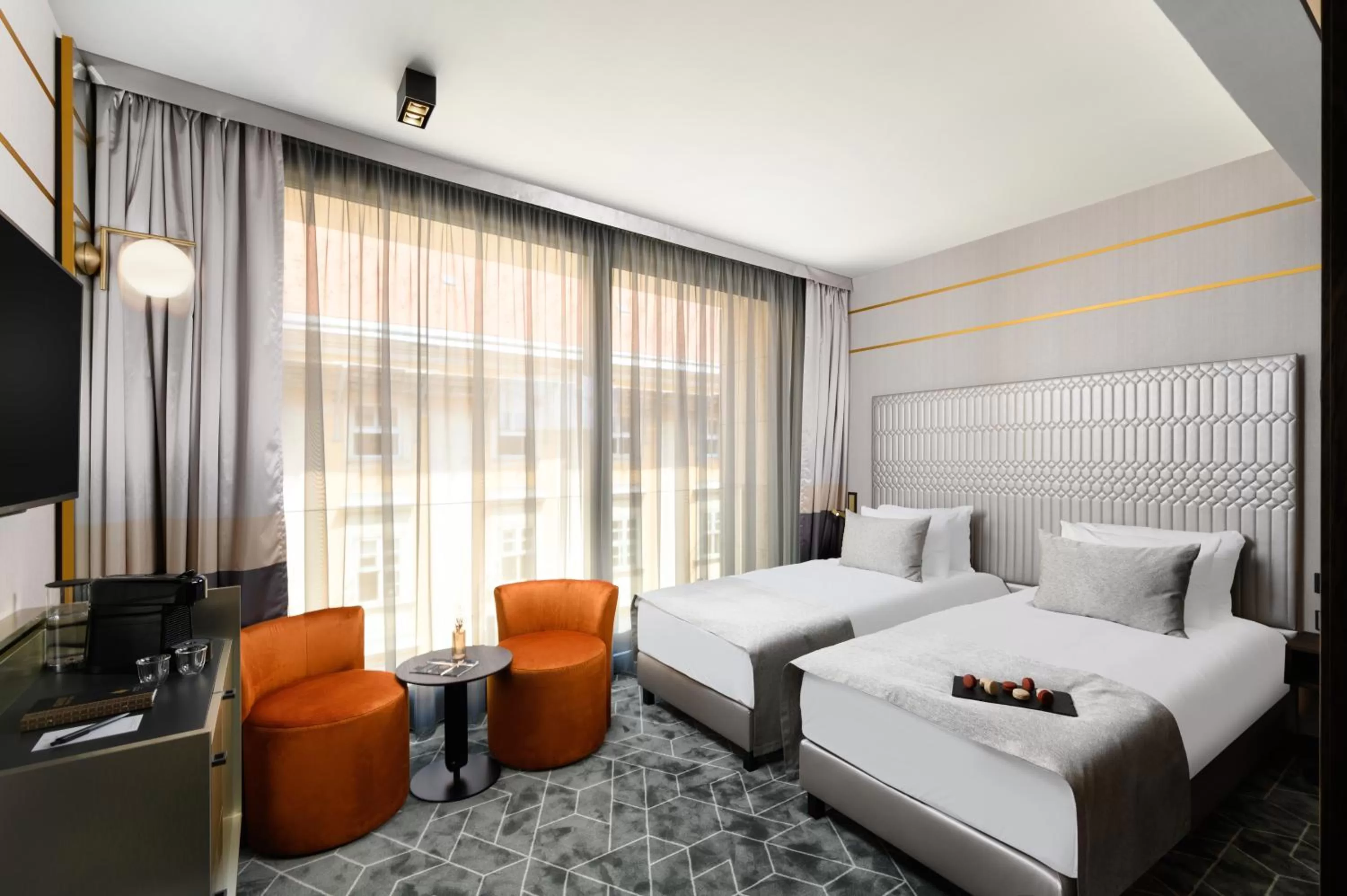 Photo of the whole room, Bed in Emerald Hotel by Continental Group