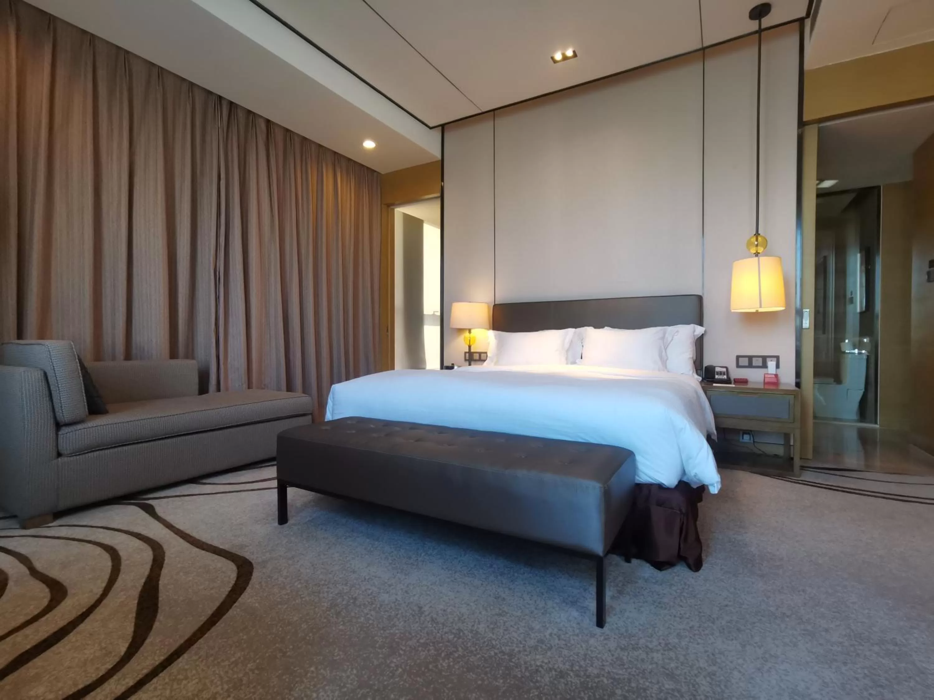 Photo of the whole room, Bed in Crowne Plaza Tianjin Meijiangnan by IHG